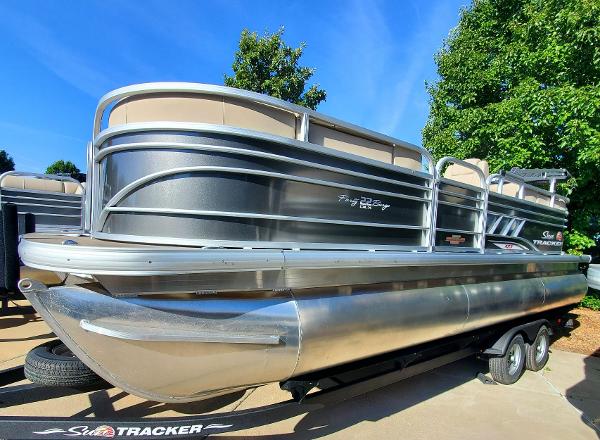 2023 Sun Tracker Party Barge 22 XP3 pontoon boat on trailer.