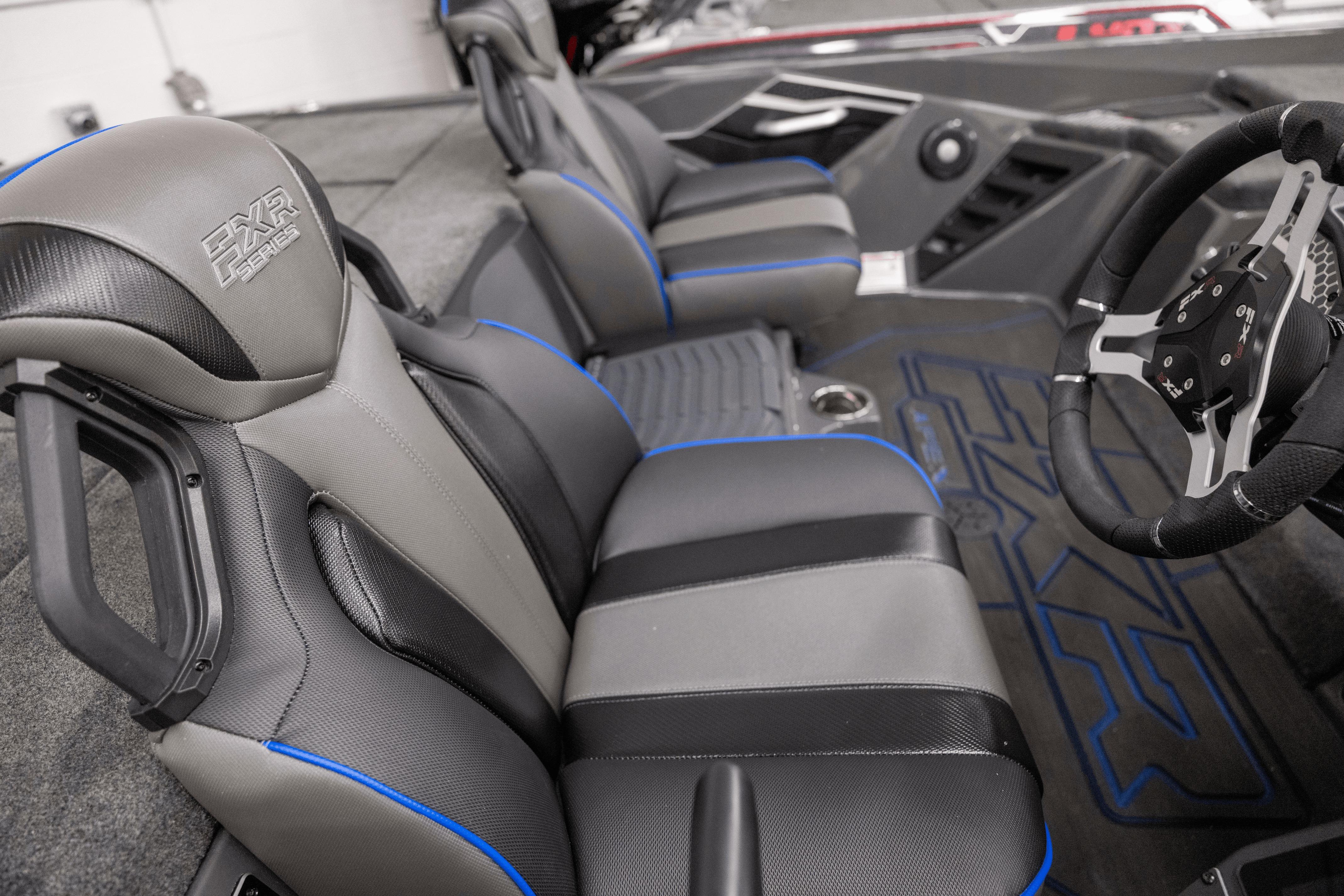 2026 Skeeter FXR20 Apex boat interior with sleek seats and modern steering wheel design.