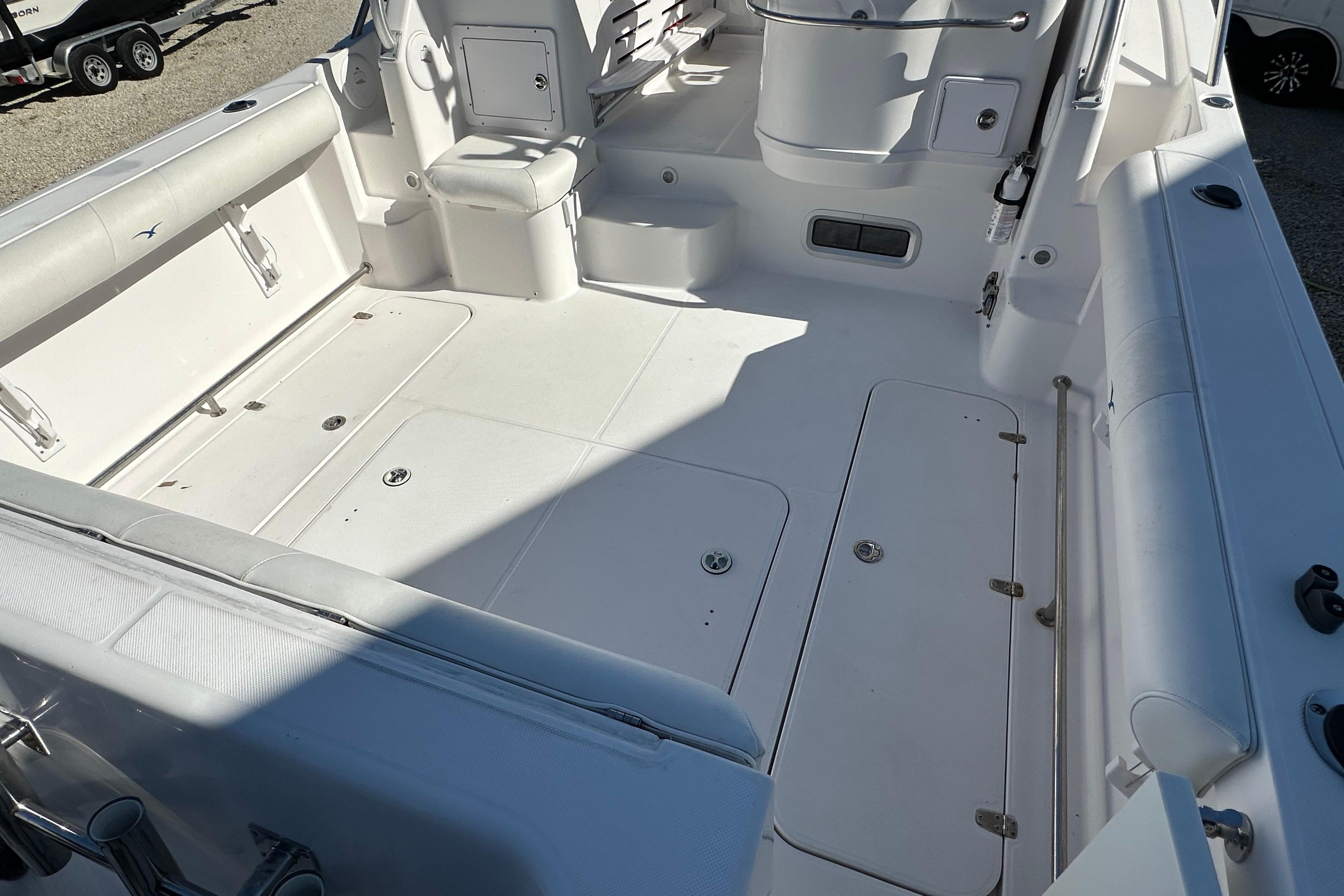 2006 Pro-Line 32 Express boat interior with spacious seating and storage compartments.