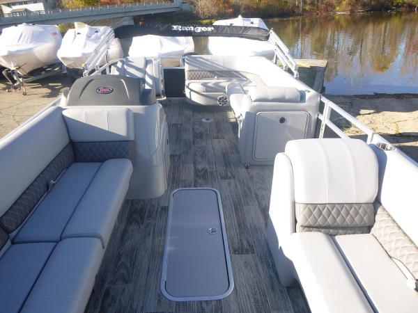 2024 Ranger Reata 223C pontoon boat with spacious seating and modern design.