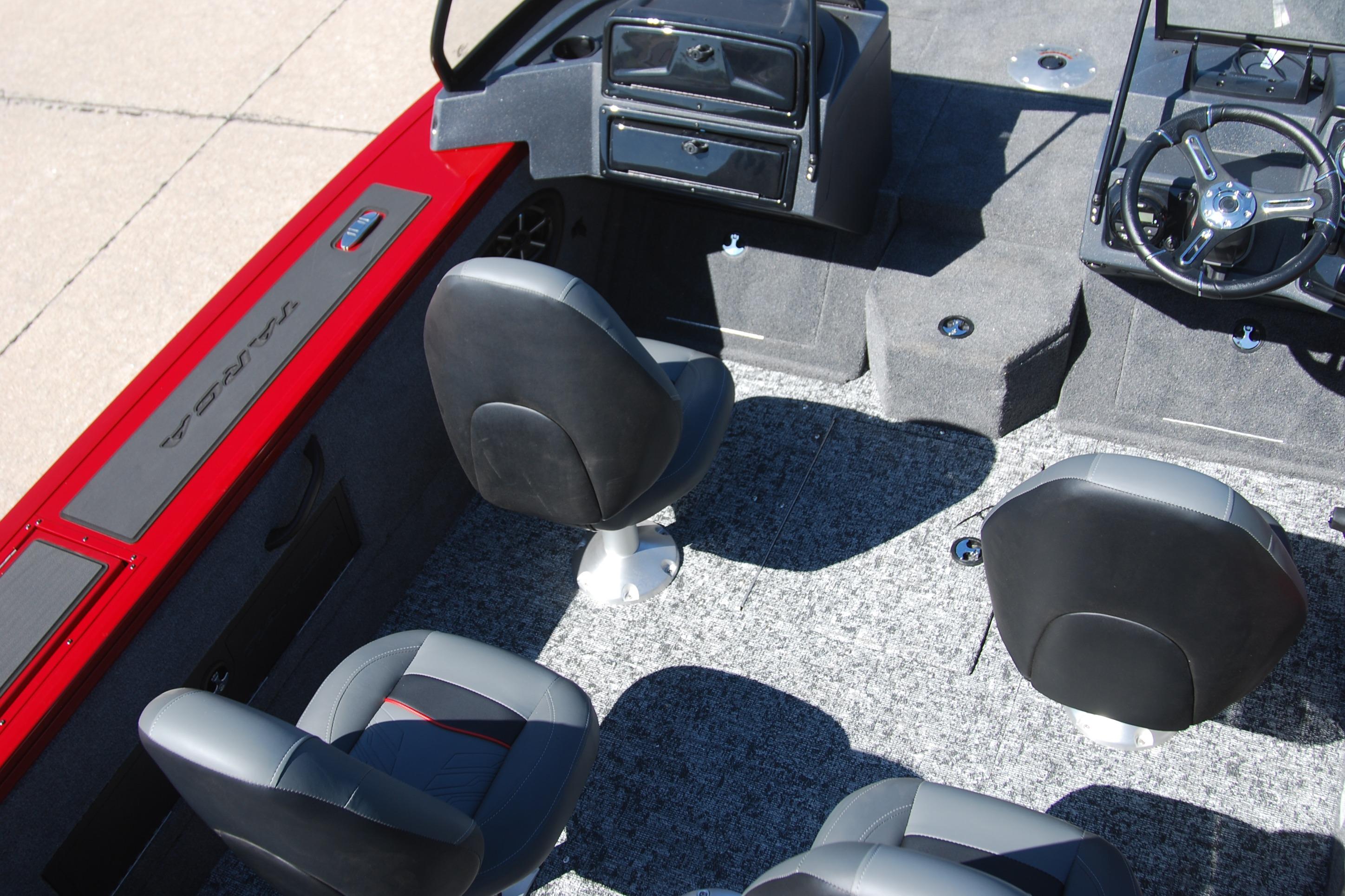 2026 Tracker Targa V-18 WT boat interior with seating and steering console.