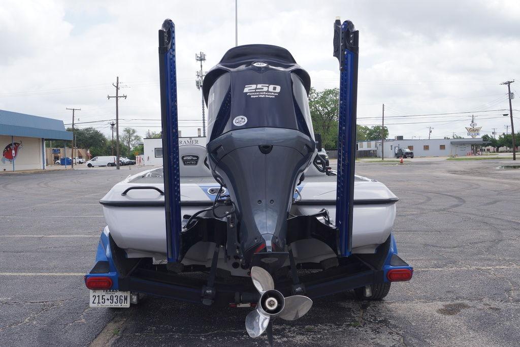2020 Skeeter FXR21 Limited boat with powerful 250 engine, parked in a lot.