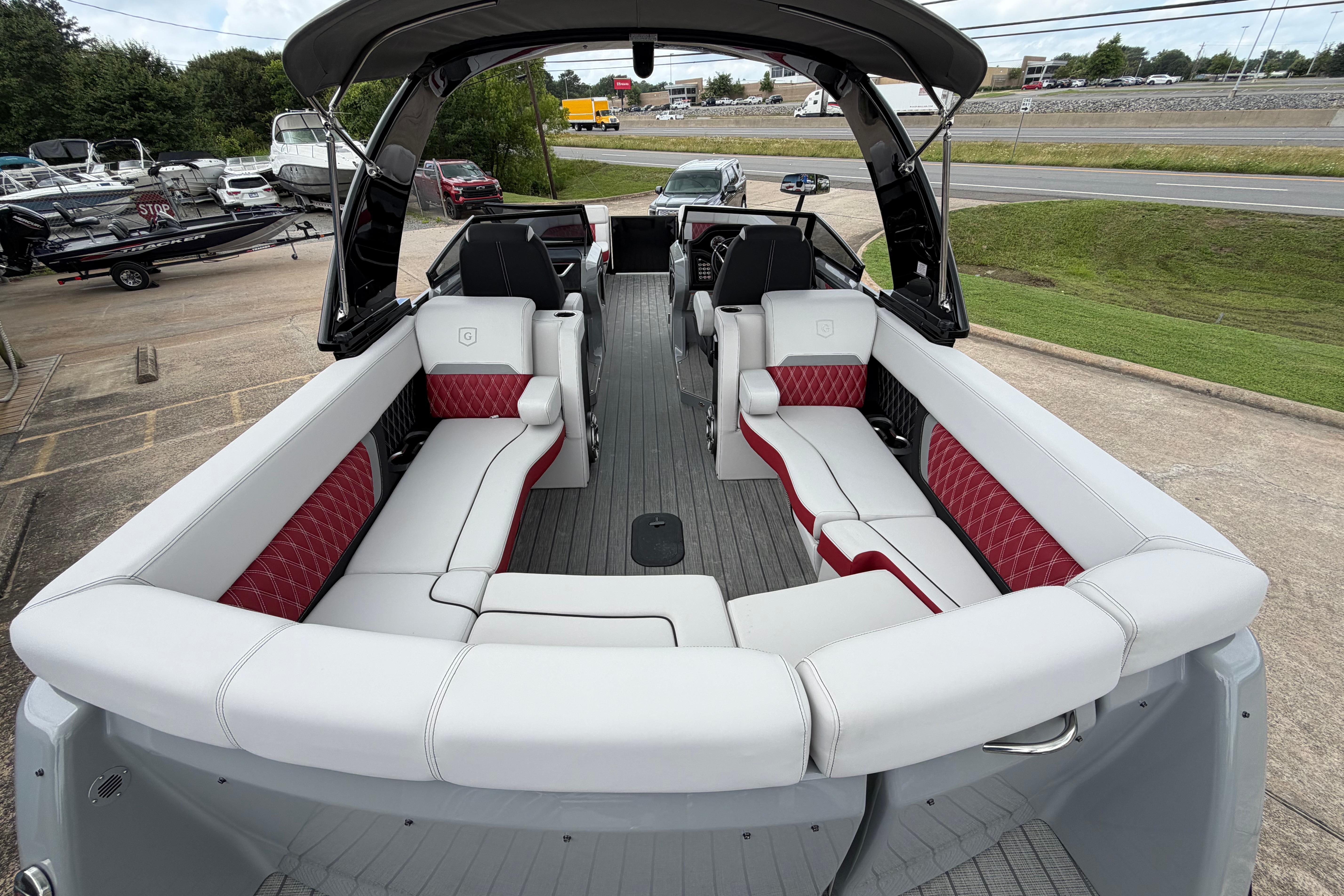 2023 Godfrey Sanpan 2700 ULW Twin pontoon boat with luxurious seating and modern design.