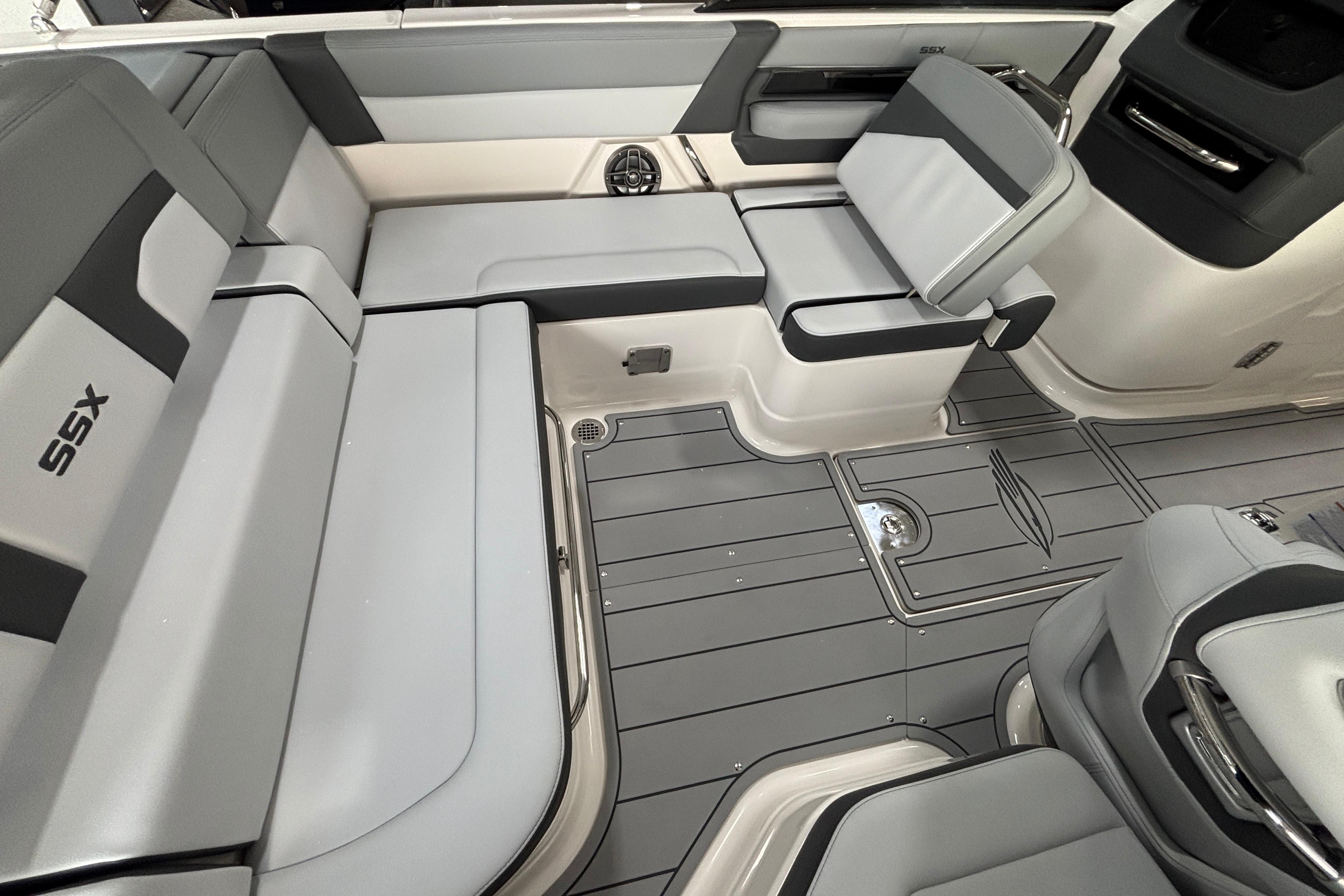 2026 Chaparral SSX 4 boat interior with sleek gray seating and modern design.