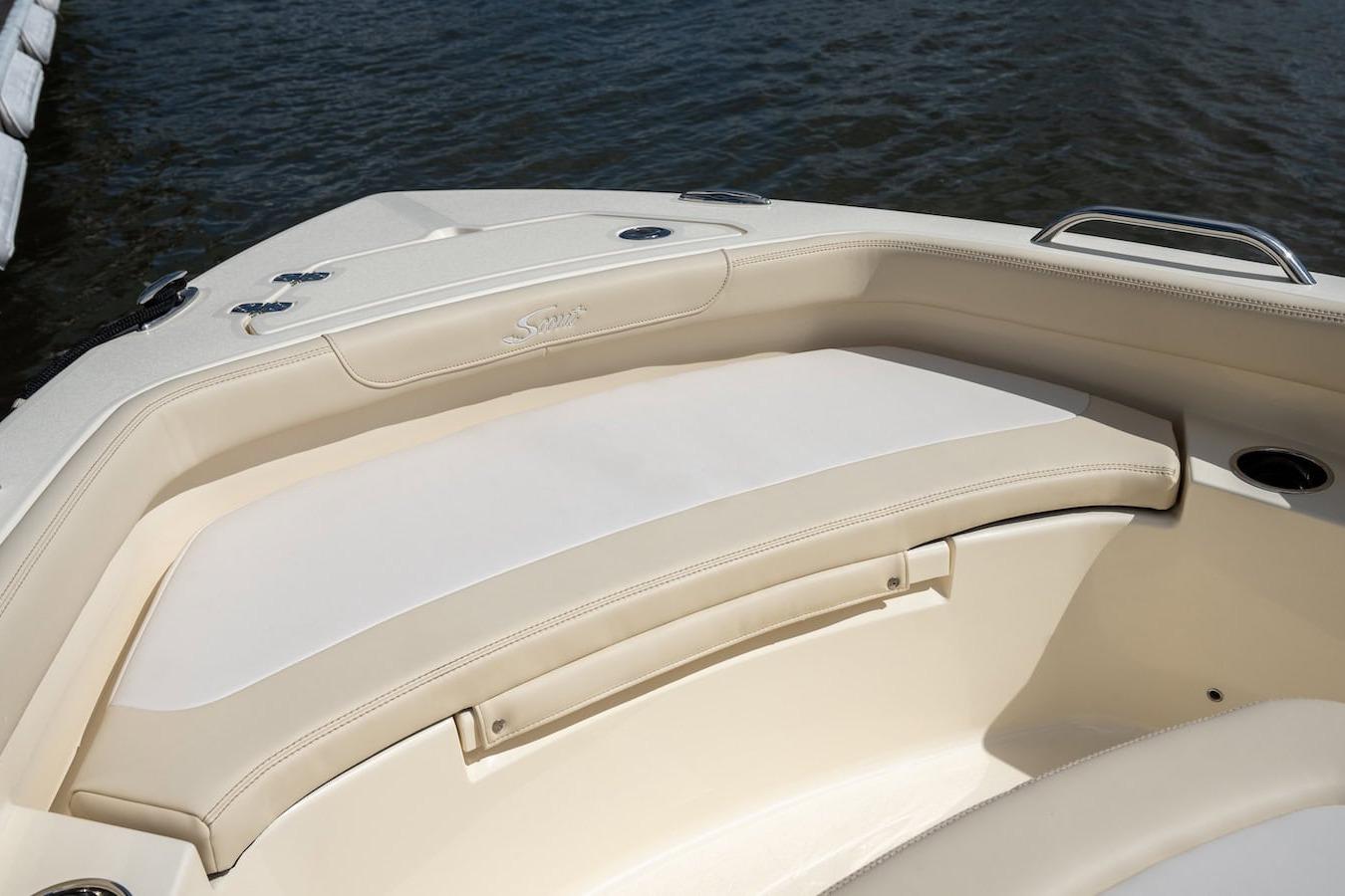 2026 Scout 188 Sportfish boat interior with cushioned seating and cup holders.