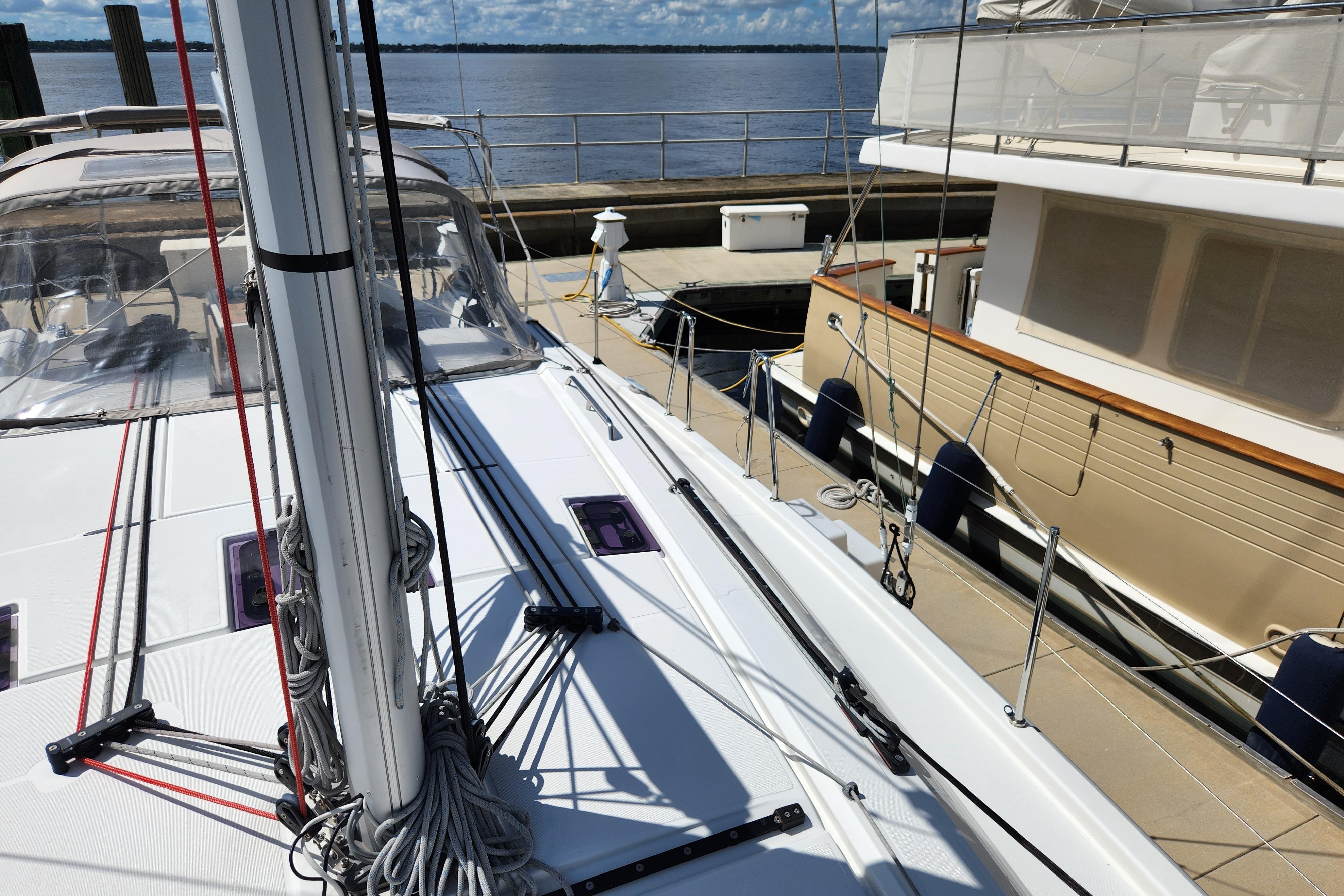 2022 Beneteau Oceanis 40.1 sailboat docked at marina, showcasing deck and rigging.
