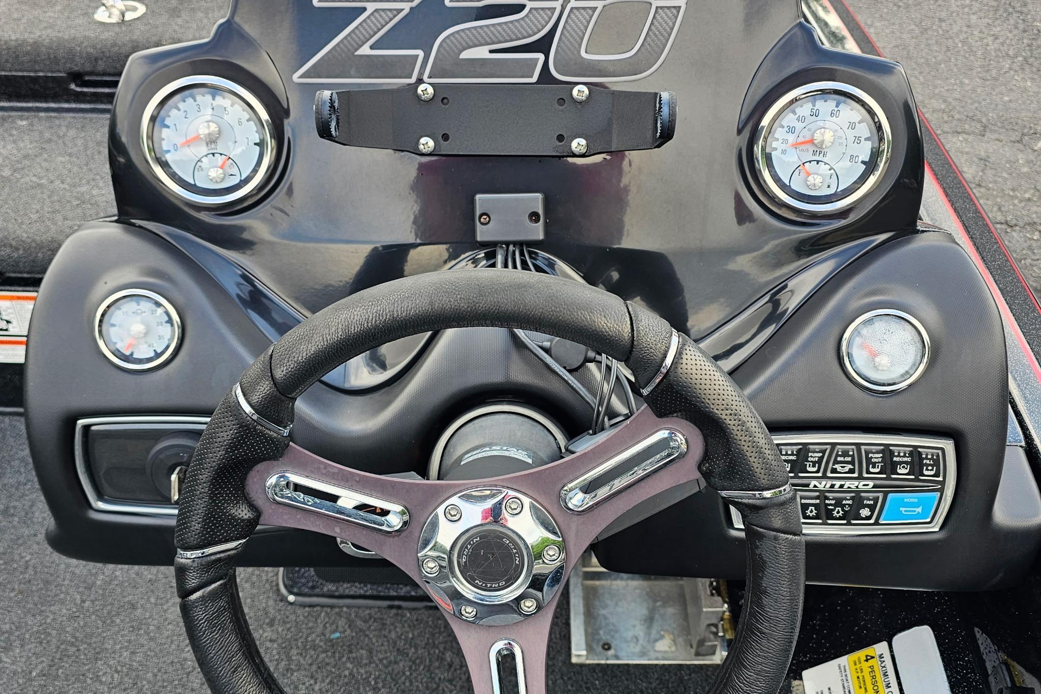 Steering console of a 2017 Nitro Z20 Pro boat with gauges and controls.
