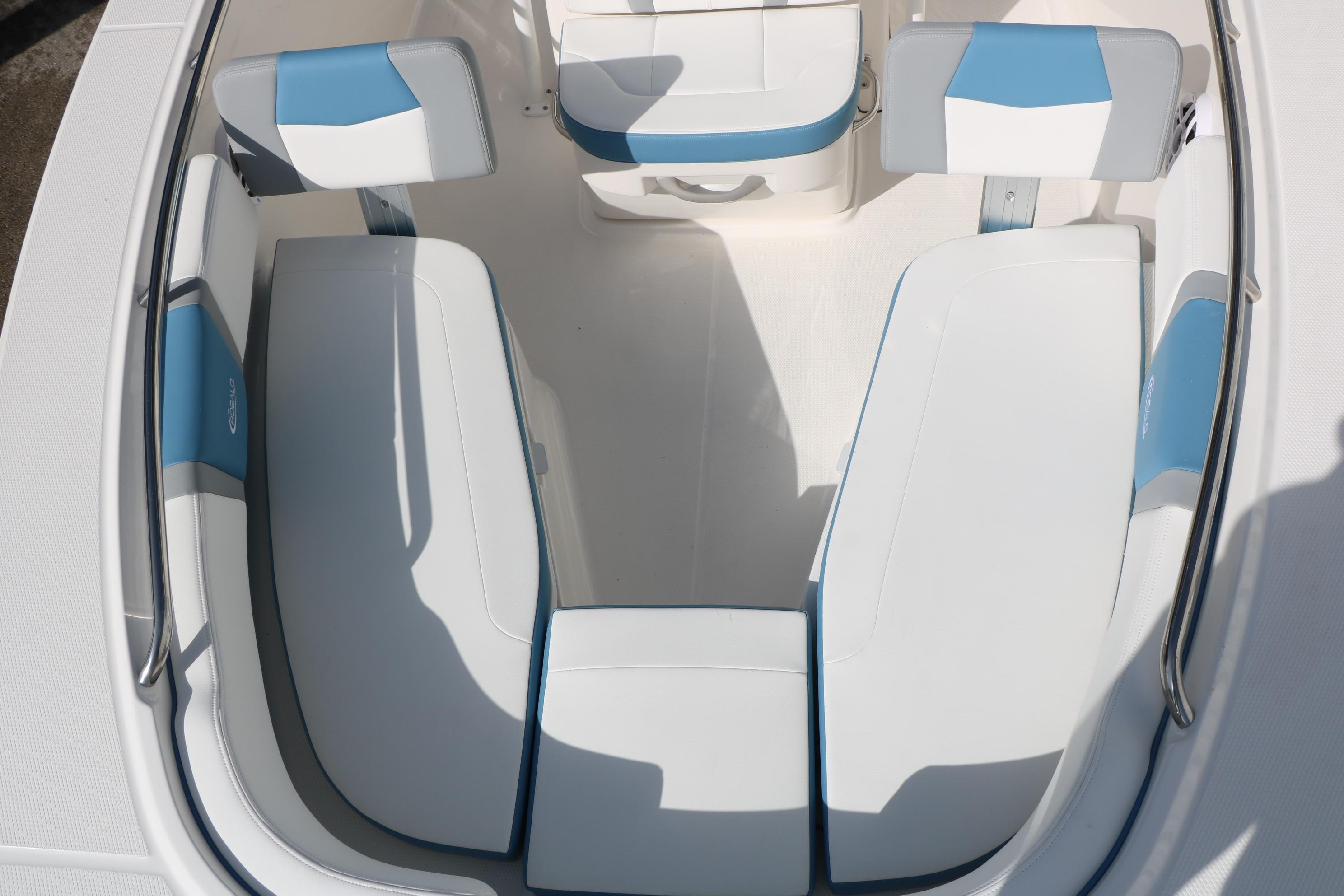 2026 Robalo R200 Center Console boat interior with white and blue seating.