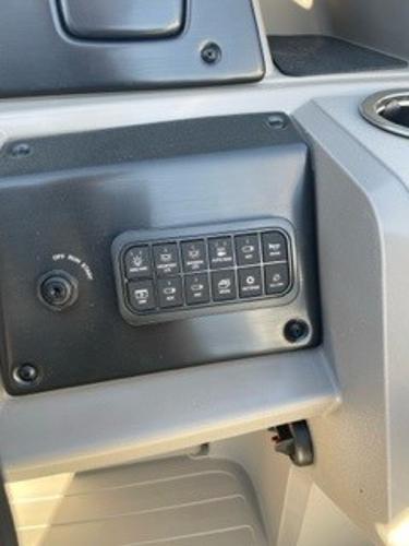 Control panel of 2024 Sun Tracker Fishin' Barge 20 DLX boat.