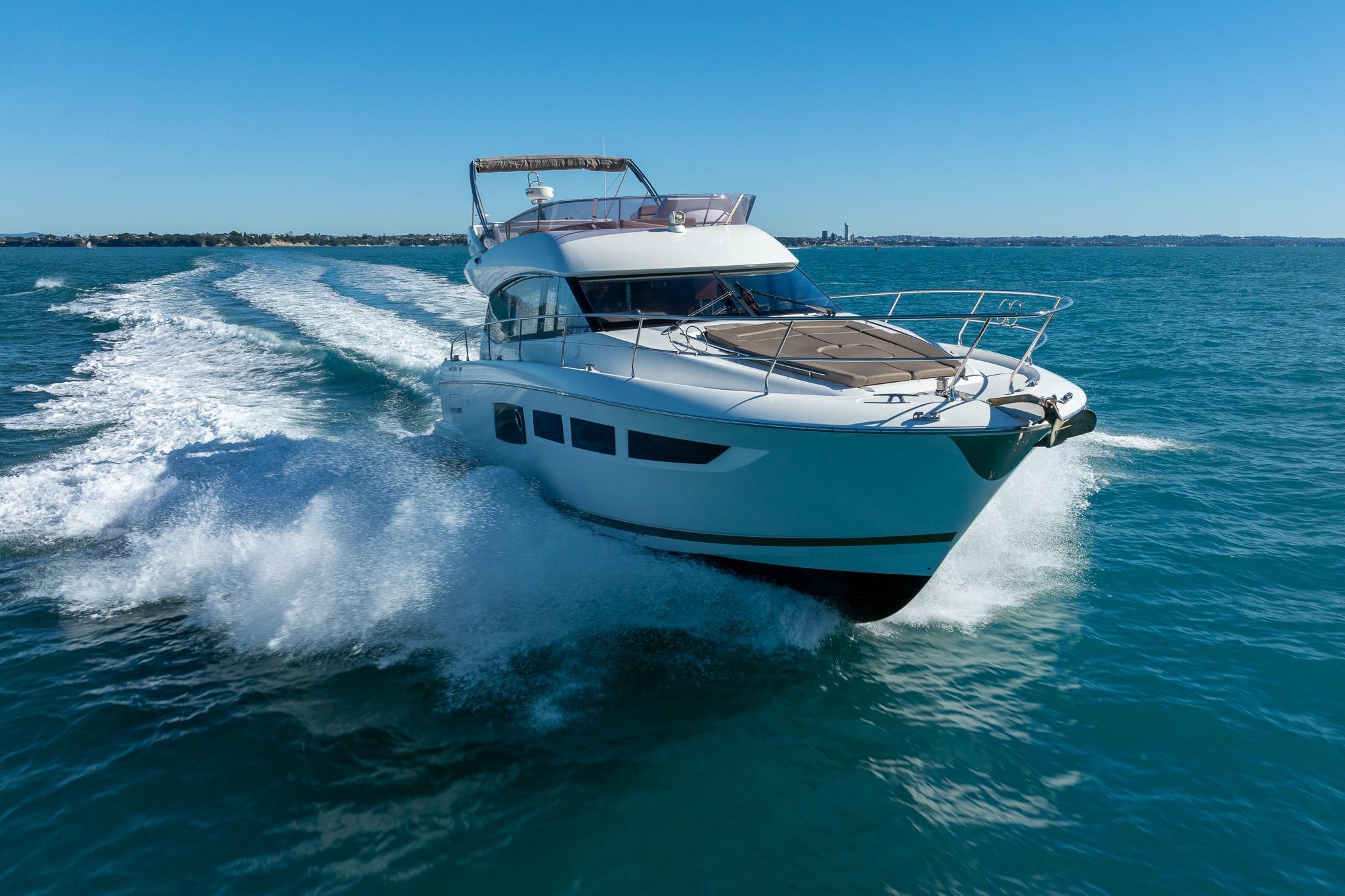 2017 Prestige 500 yacht cruising on open blue waters.