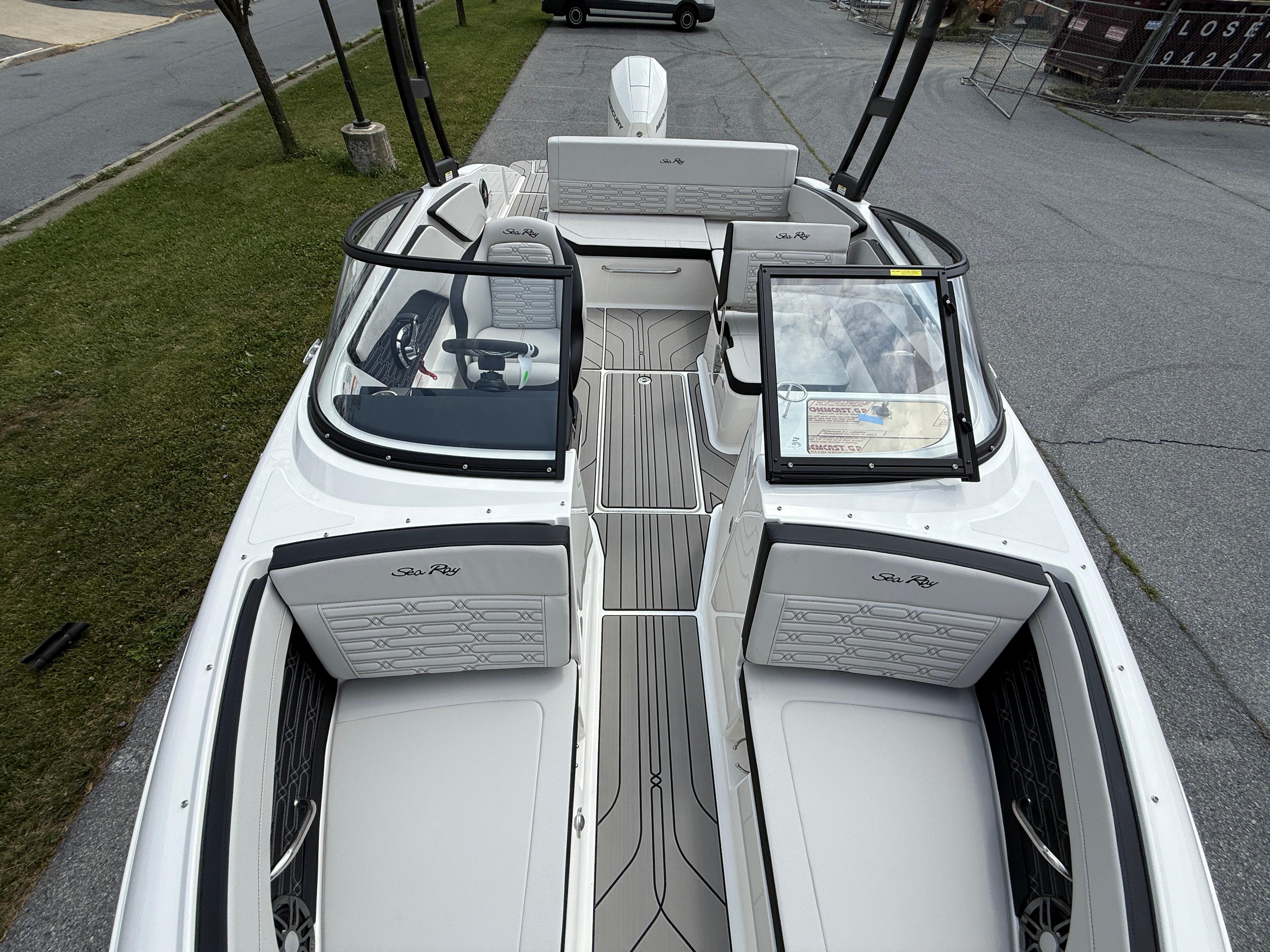 2026 Sea Ray SPX 210 Outboard boat interior with sleek seating and modern design.