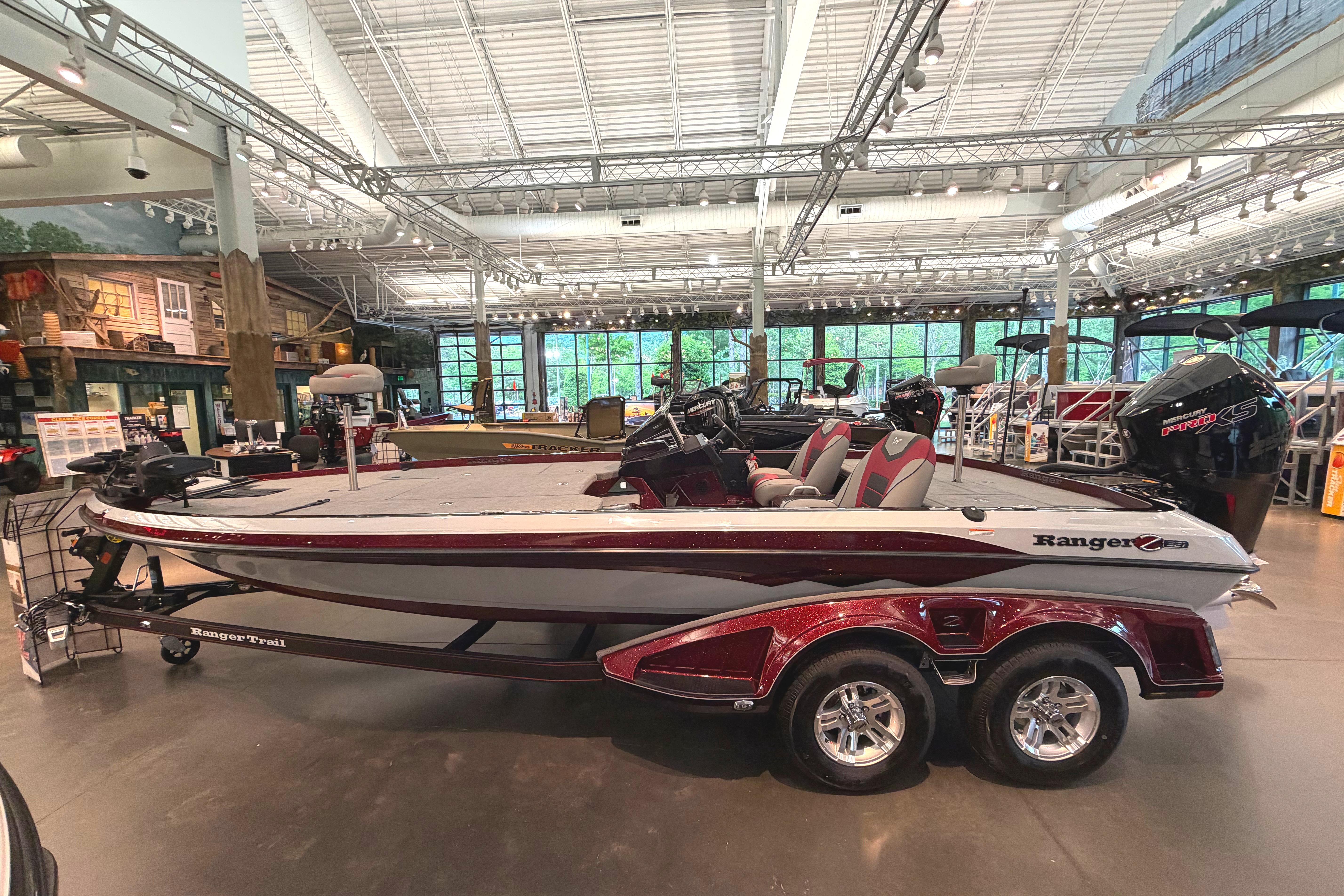 2026 Ranger Z521 boat displayed indoors, featuring sleek design and modern equipment.