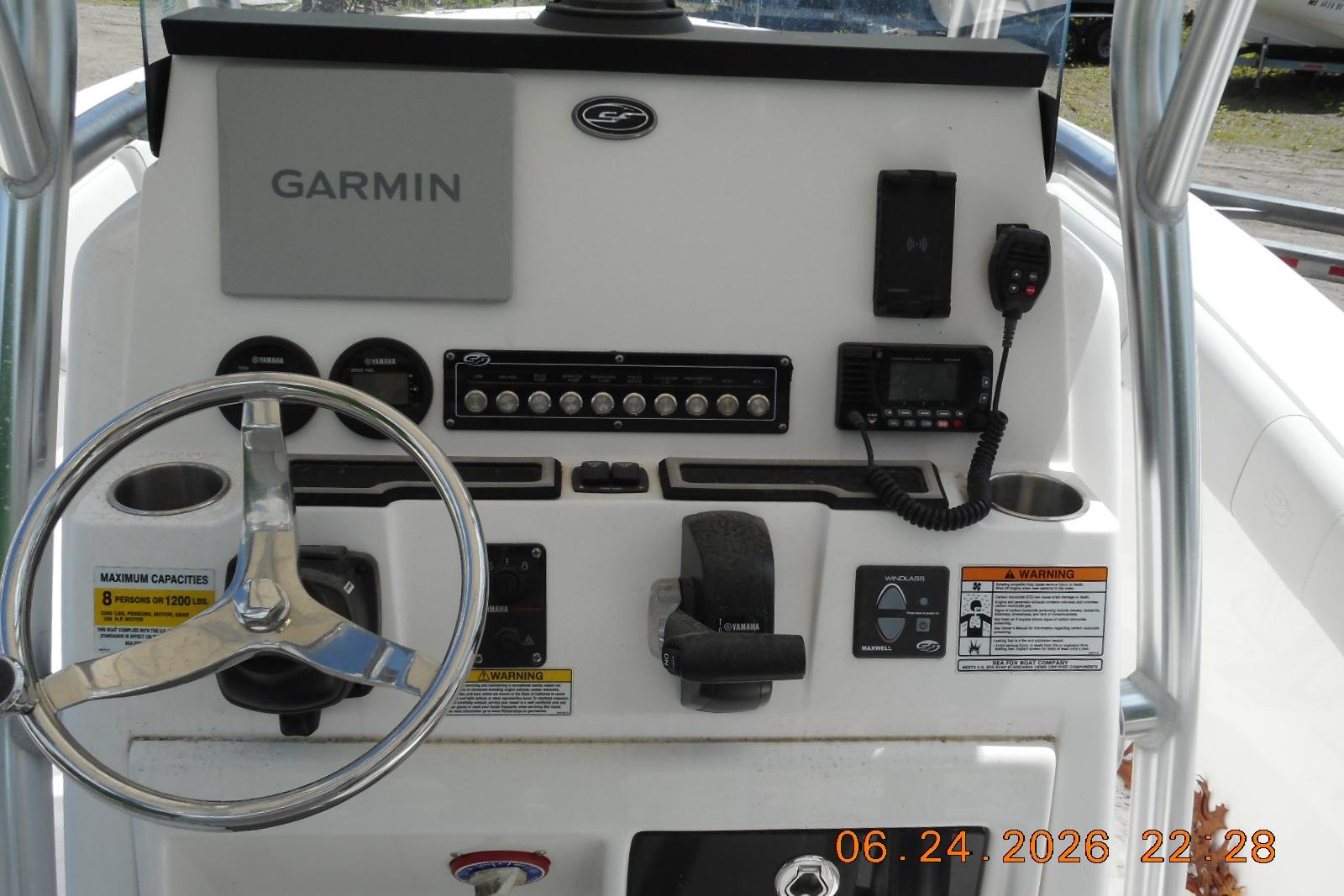 2022 Sea Fox 228 Commander dashboard with Garmin navigation and control panel.