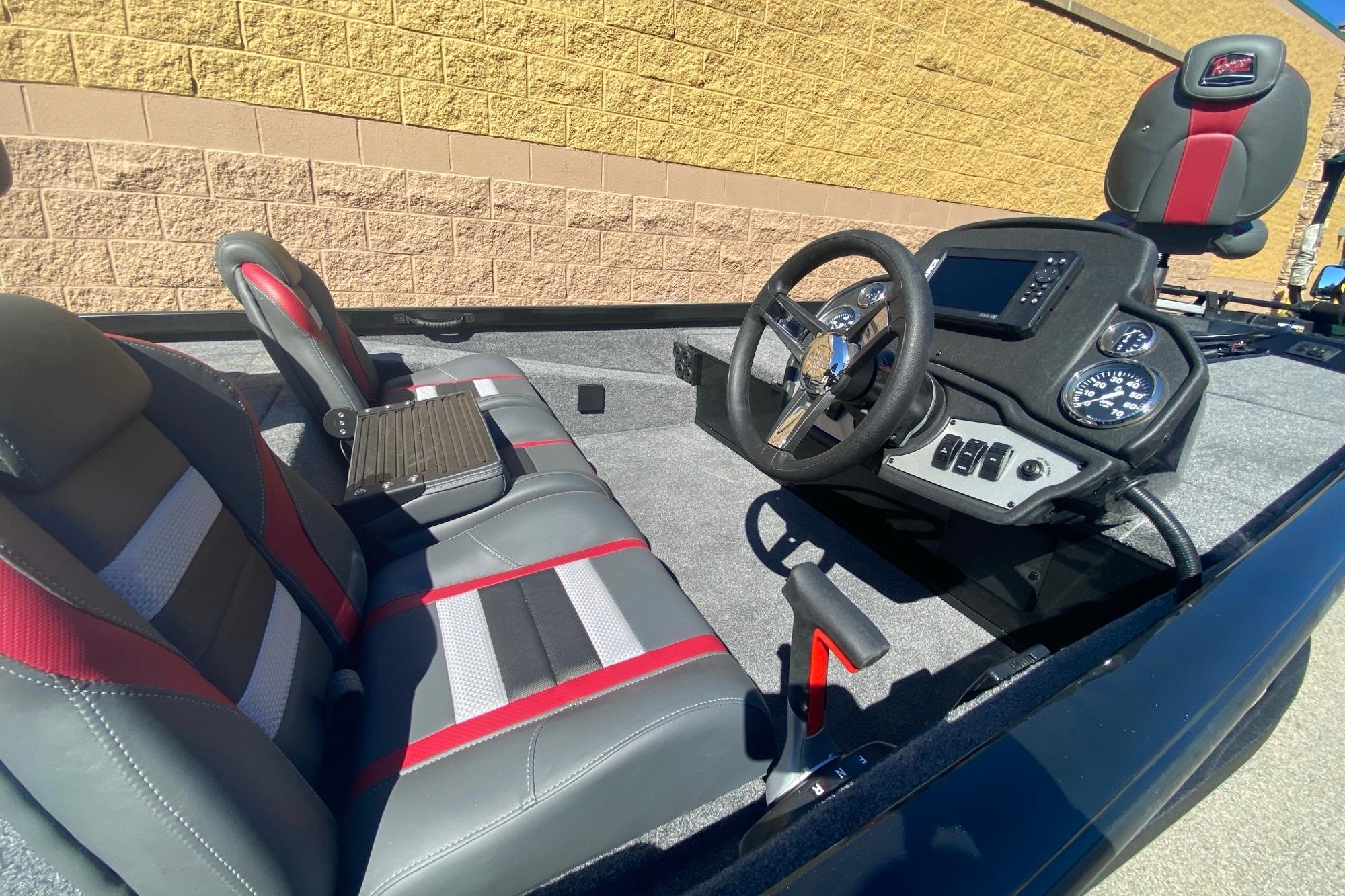 2026 Ranger RT188 boat interior with steering wheel, dashboard, and dual seats.
