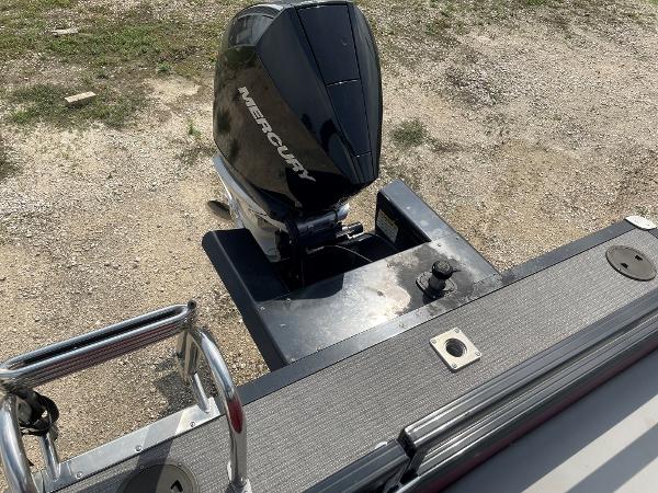 2023 Regency 250DL3 boat with Mercury outboard motor, viewed from above.