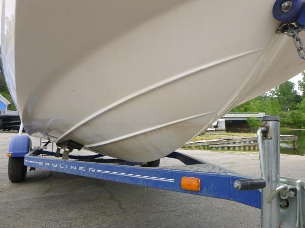 2007 Bayliner 197 Deck Boat on a blue trailer.