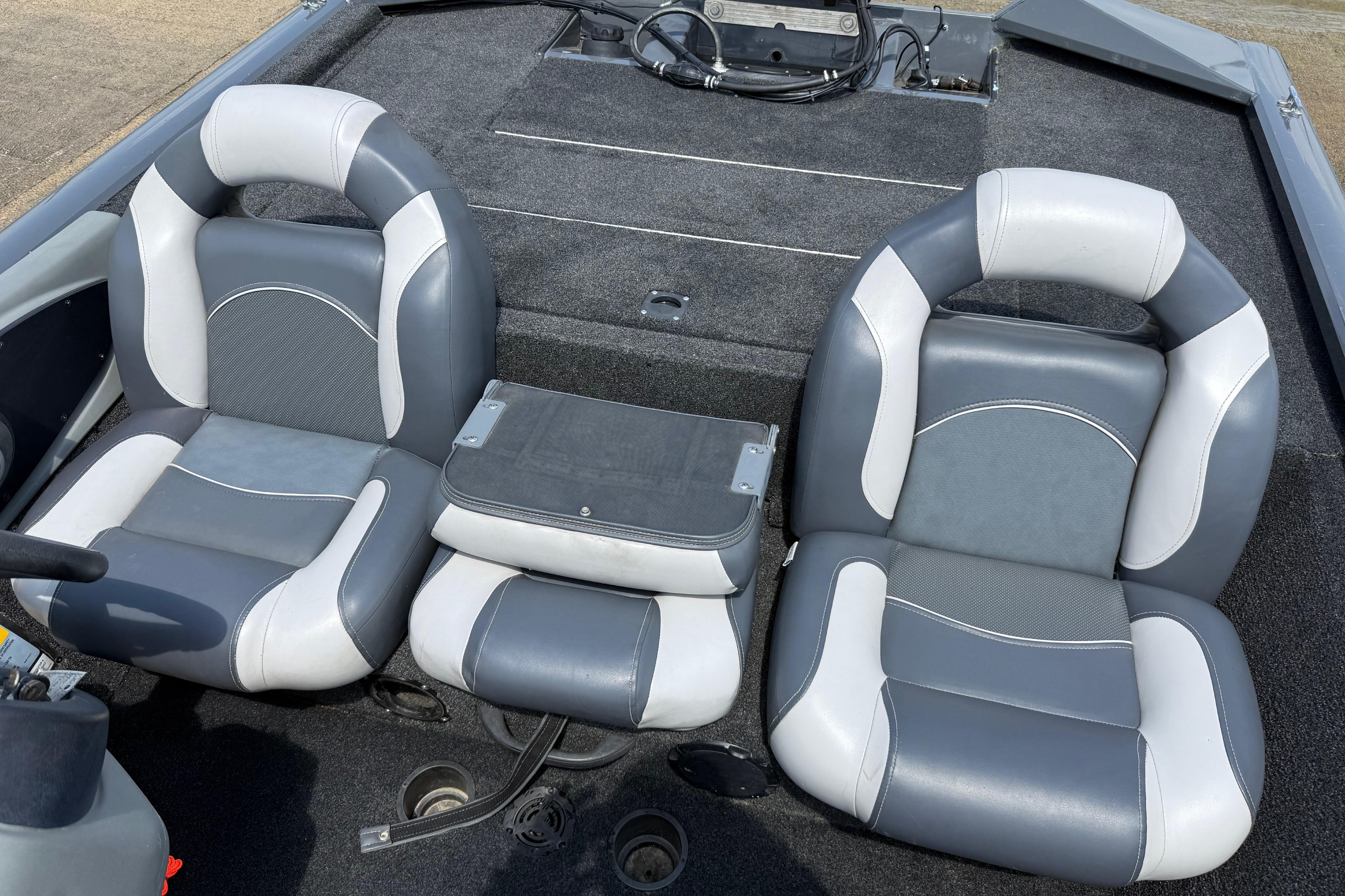 2015 Tracker Pro Team 190 TX boat interior with gray and white seating.