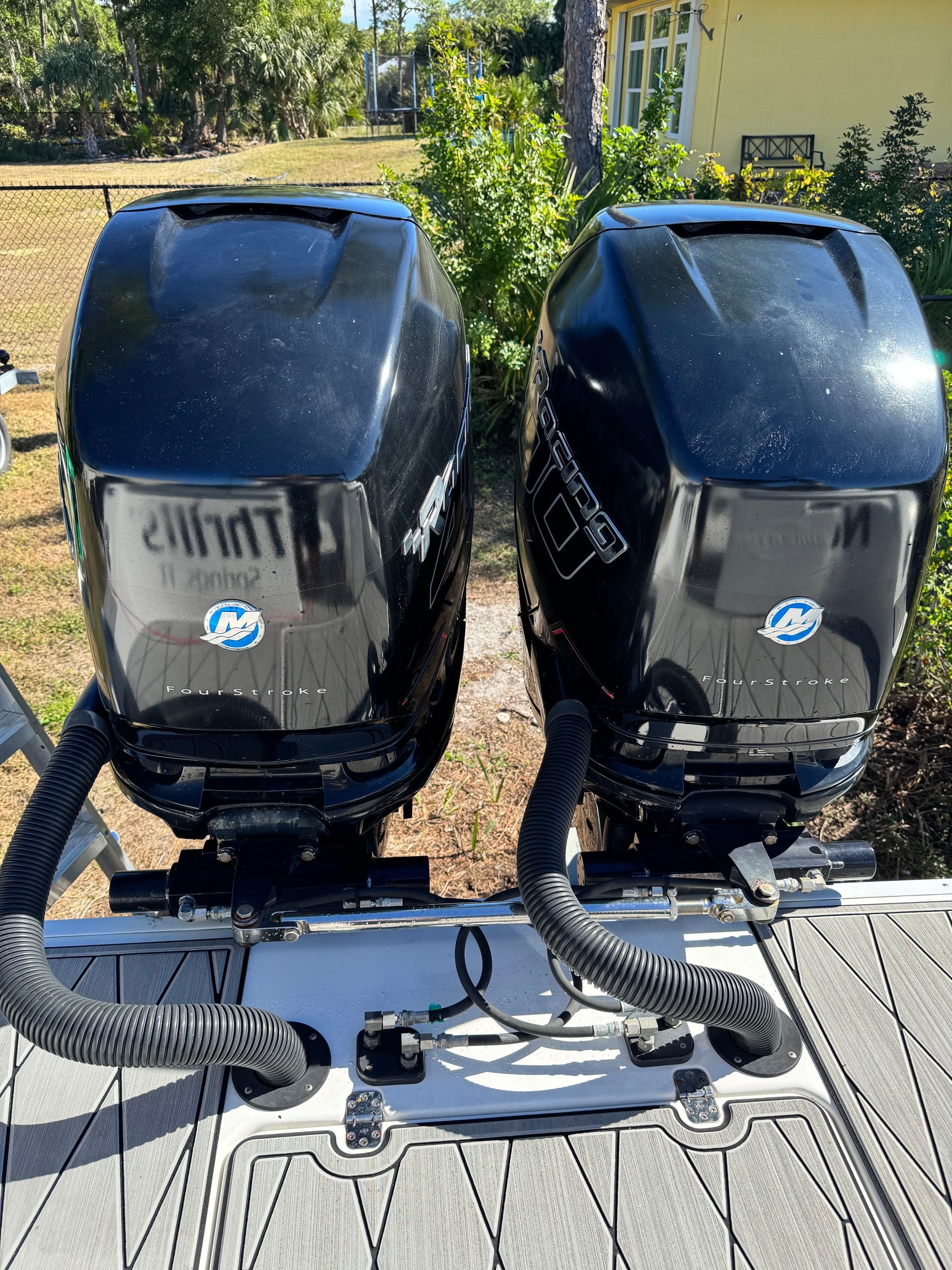 Two Mercury outboard engines on a 2017 Sunsation 32 CCX boat.