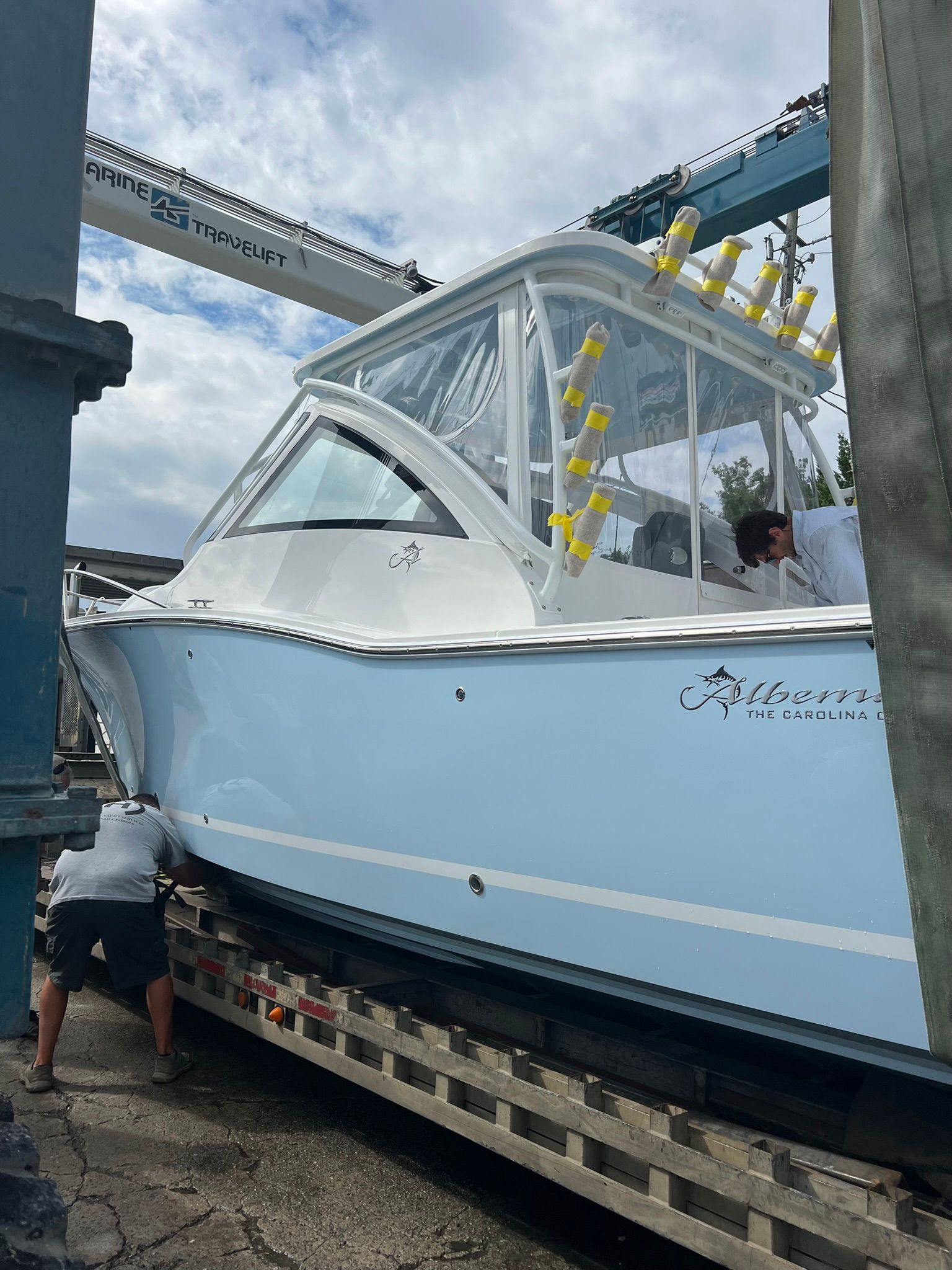 A 2024 Albemarle 30 Express boat being transported on a trailer.