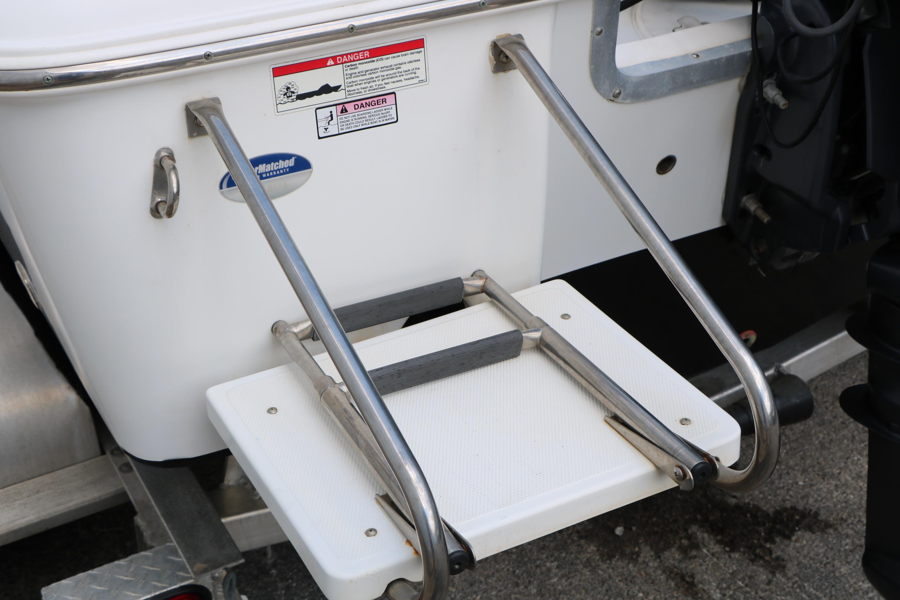 2015 Sea Hunt BX 22 BR boat with stainless steel swim ladder.