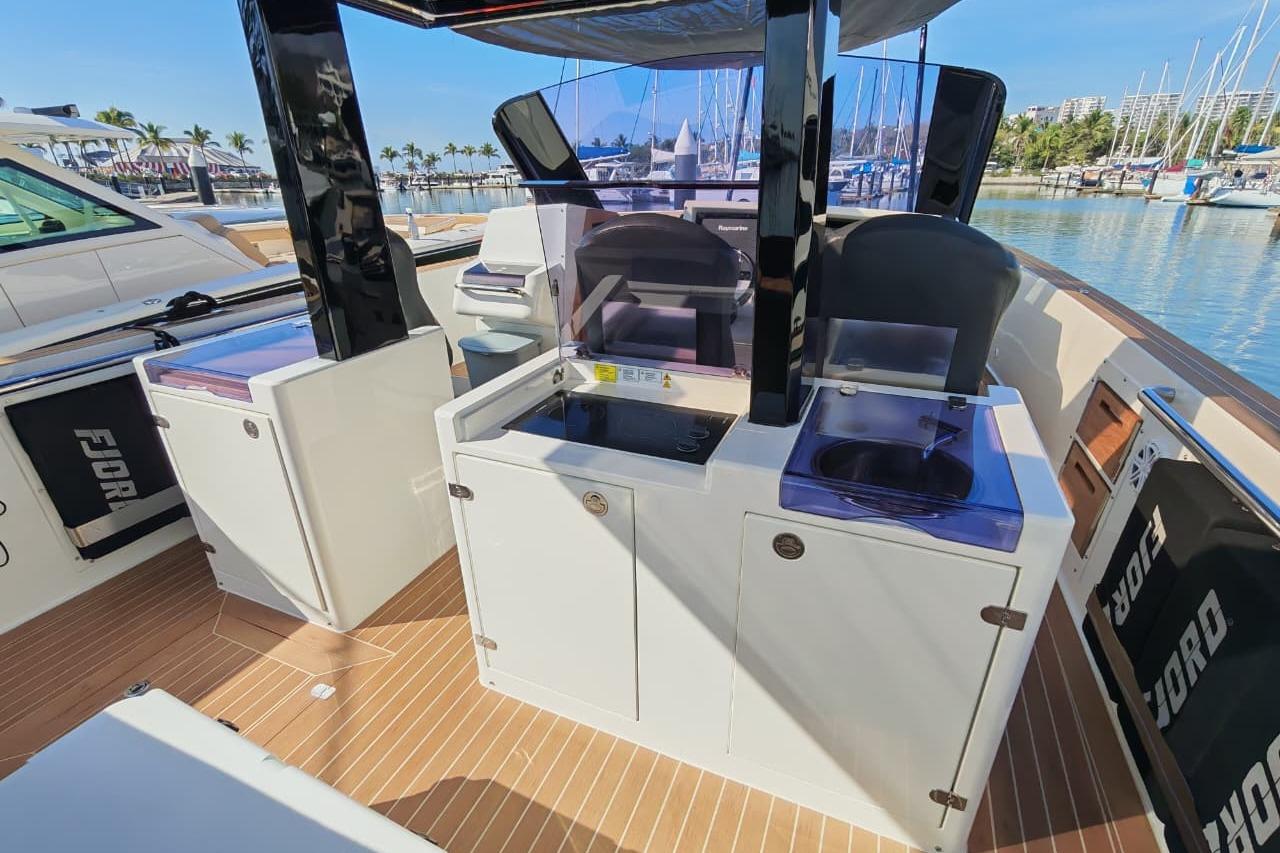 2015 Fjord 40 Open yacht interior with modern amenities and sleek design.