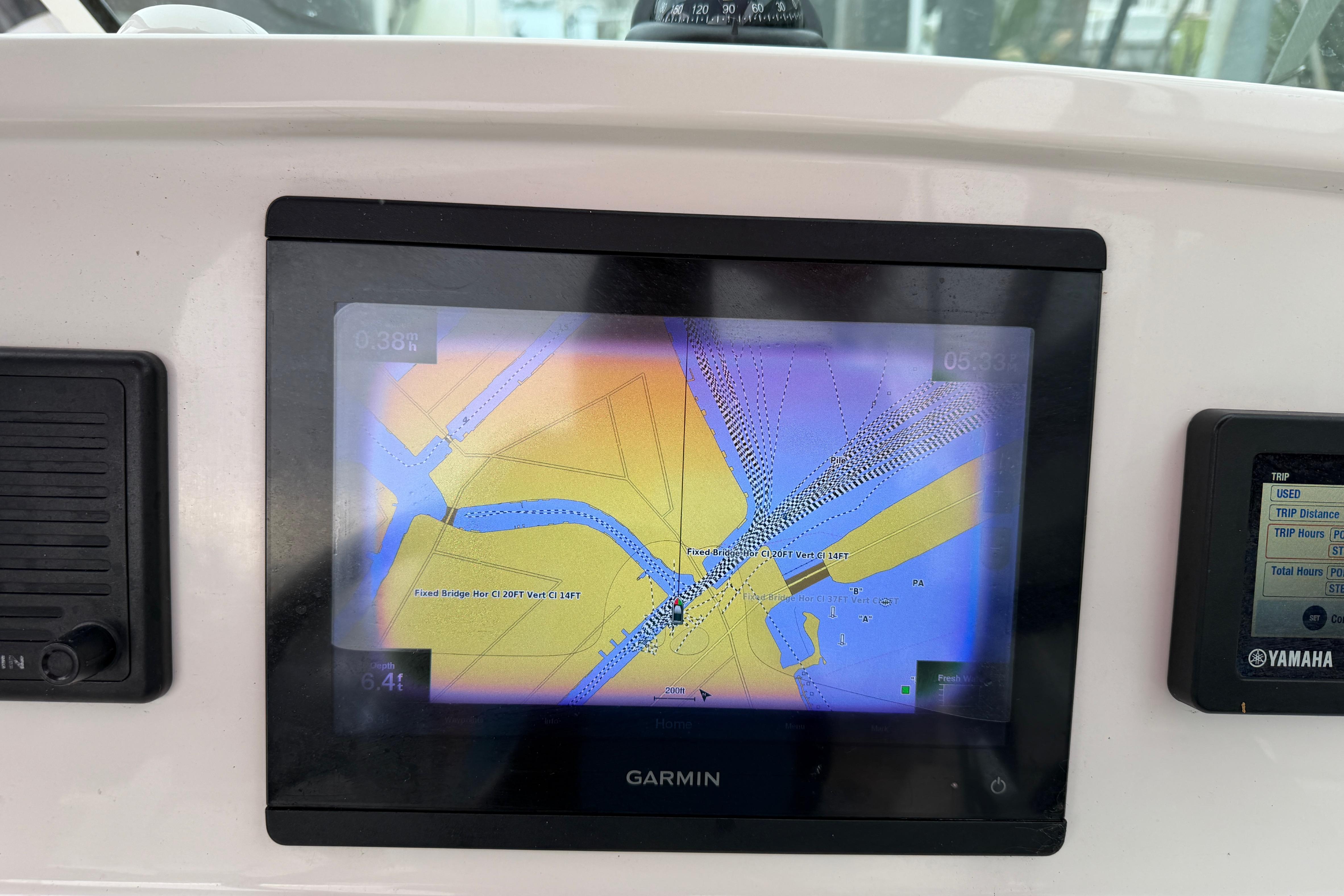 Garmin navigation display on 2019 World Cat 230 DC boat dashboard.