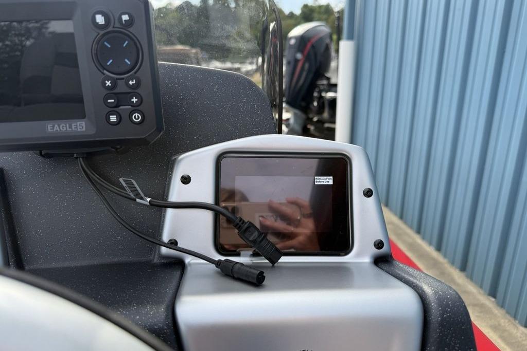 Control panel of 2026 Tracker Pro Team 175 boat with electronic display and controls.