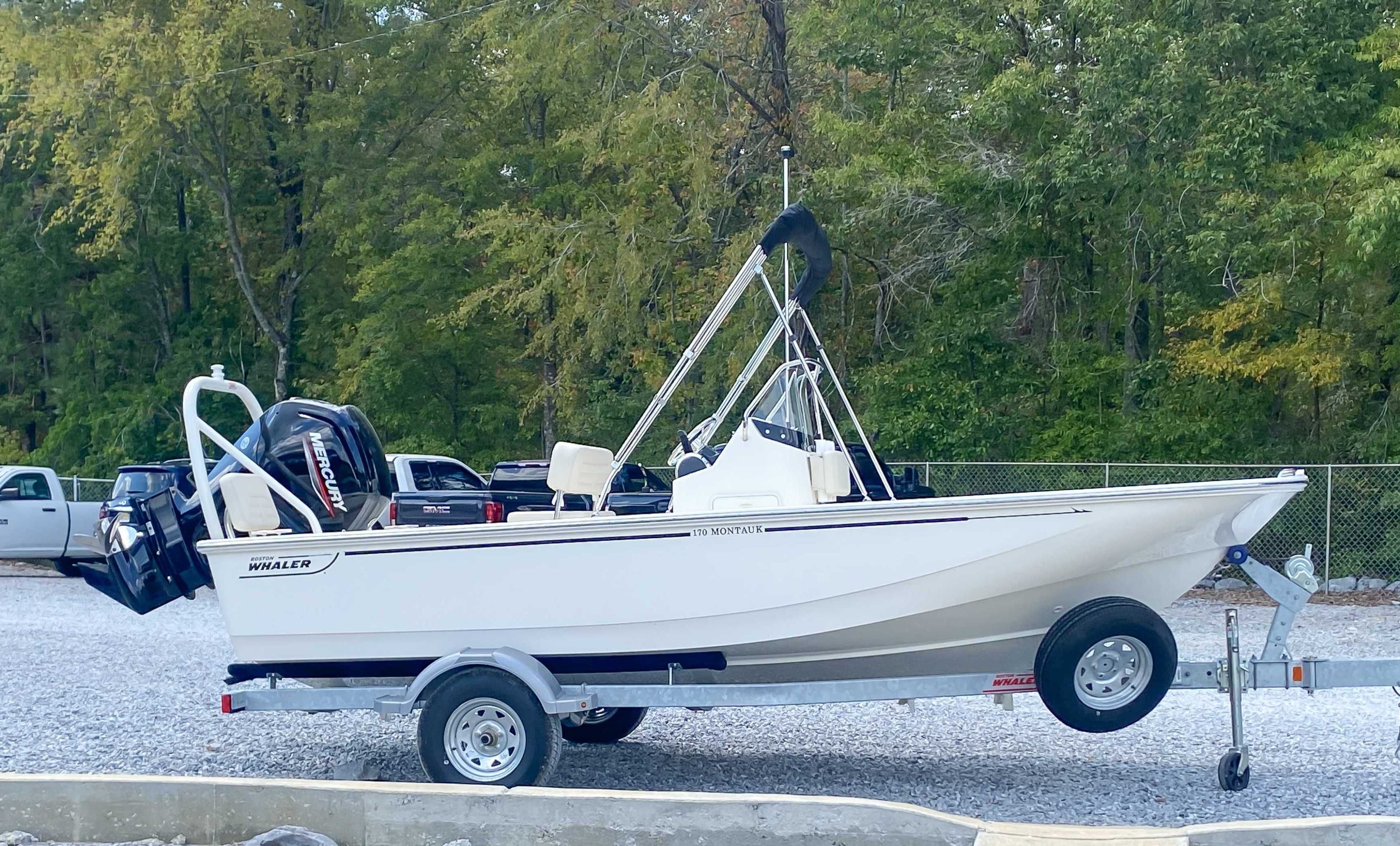 2025 Boston Whaler 170 Montauk on trailer parked outdoors.