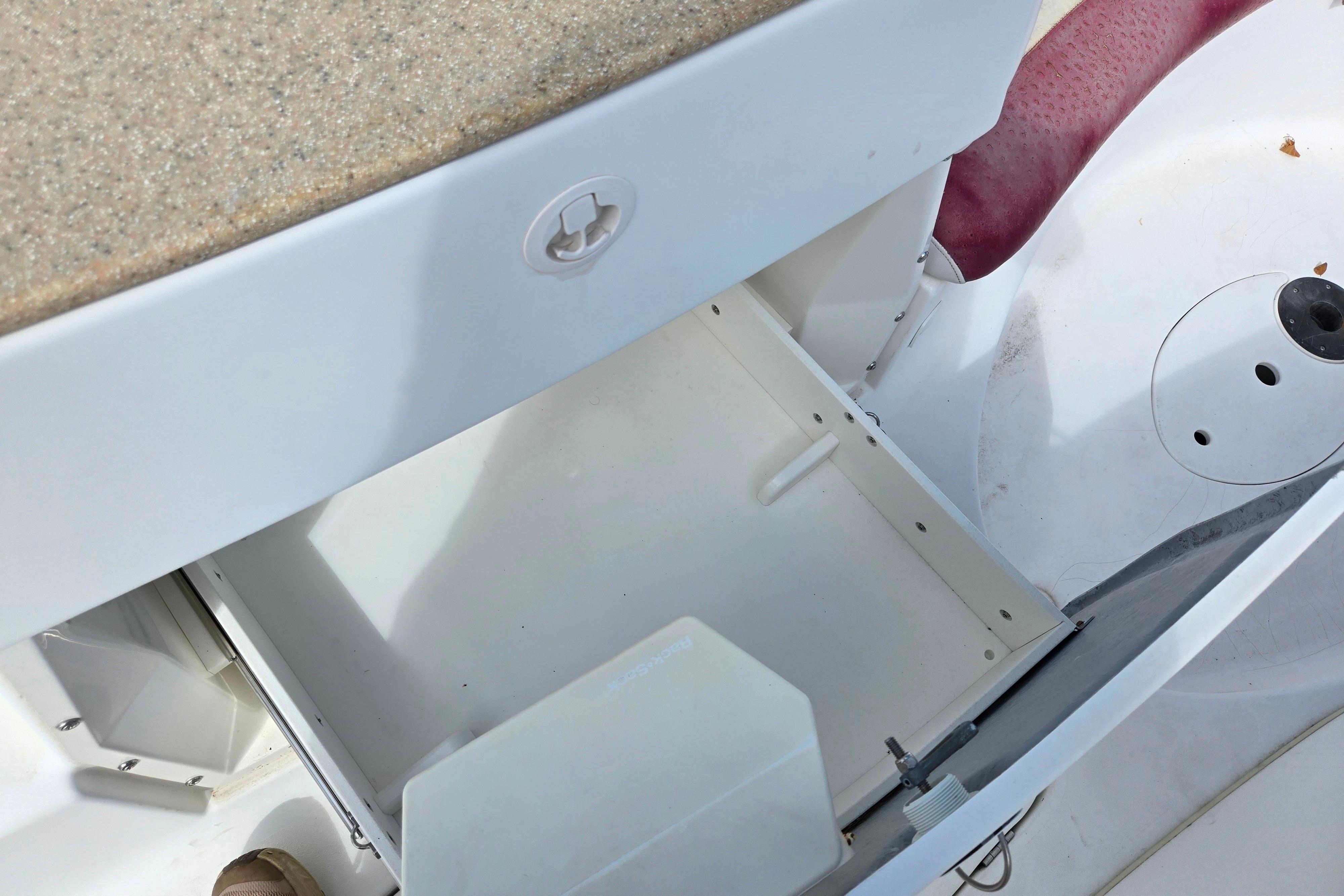2004 Sea-Doo Islandia boat interior storage compartment detail.