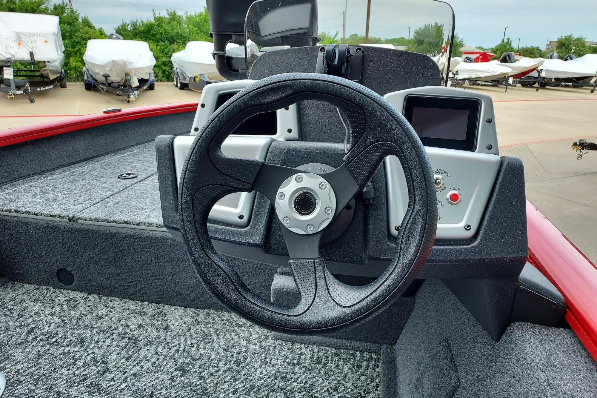 Steering console of 2026 Tracker Pro Team 175 Crappie Edition boat, featuring modern controls.