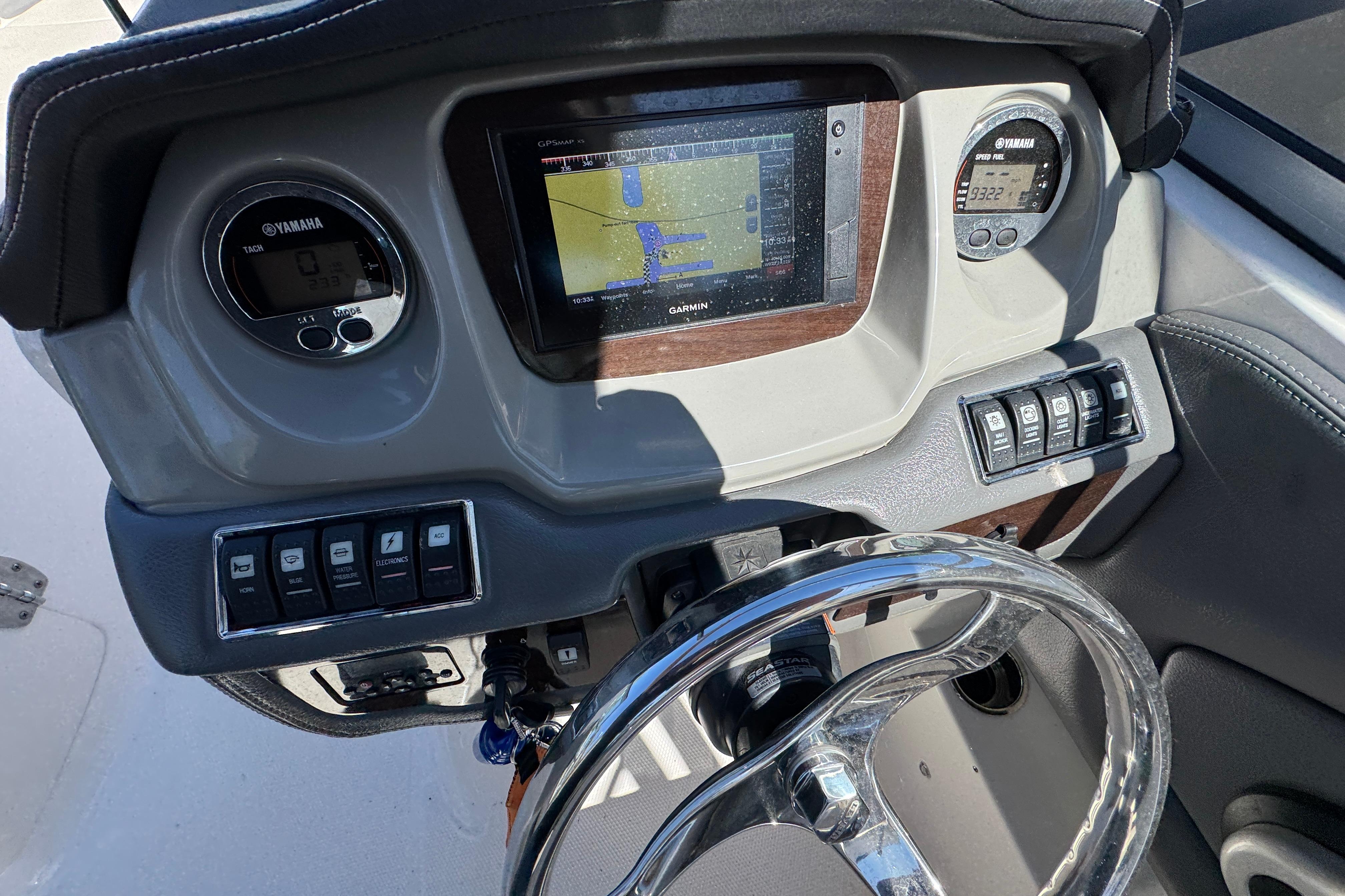 Dashboard of a 2018 Chaparral 250 Suncoast boat with Garmin navigation system.