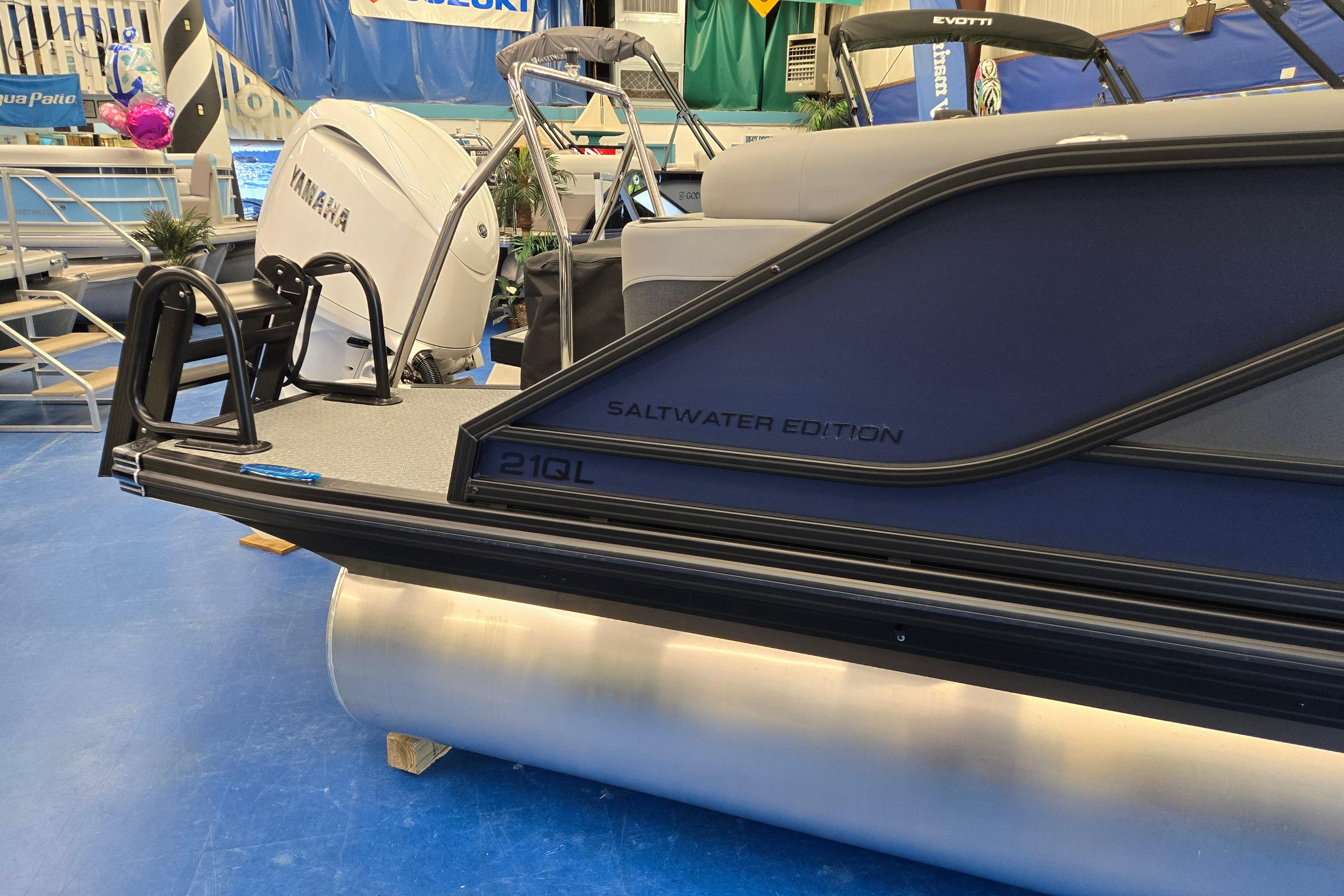 2026 Evotti 521QL Saltwater Edition boat with Yamaha engine displayed indoors.