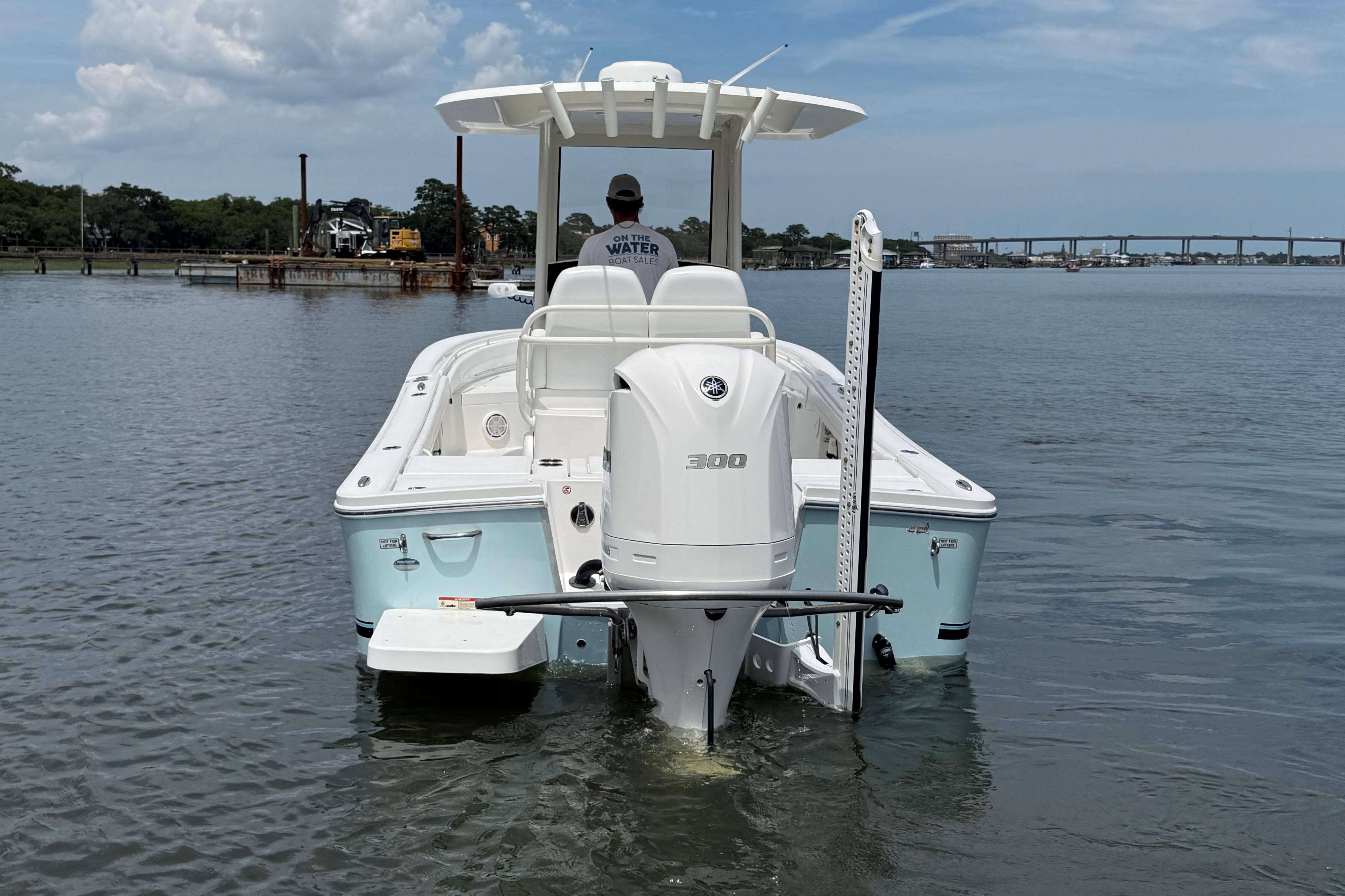 2019 Regulator 26XO boat with Yamaha 300 engine on calm water.