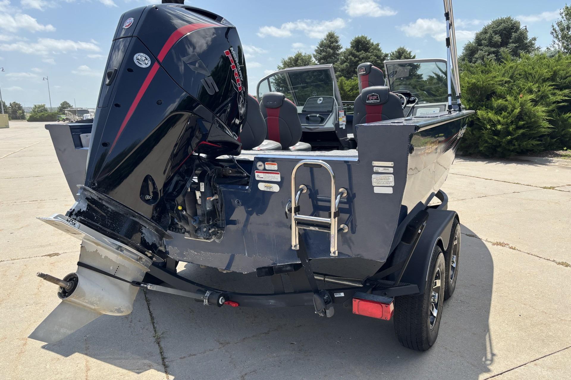 2021 Ranger VX1788 WT boat with powerful outboard motor on trailer.
