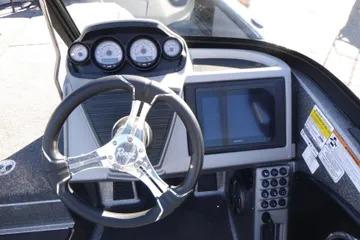2026 Ranger 2080MS boat dashboard with steering wheel, gauges, and touchscreen display.