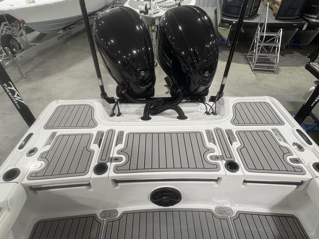 2026 Tidewater 2700 CB boat with dual outboard engines and sleek deck design.