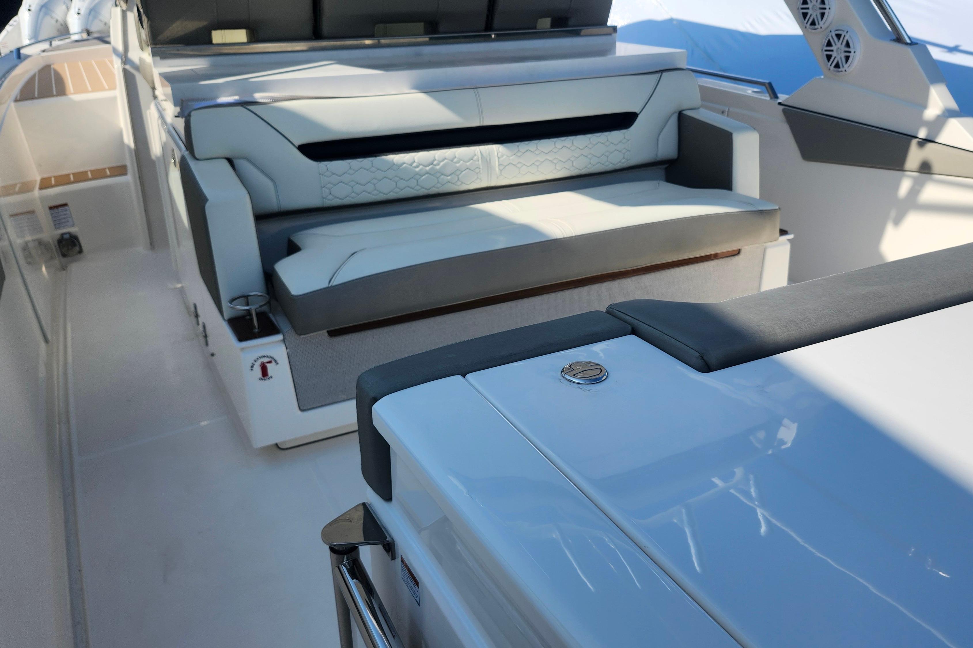 2024 Tiara Yachts 34 LS interior with luxurious seating and modern design.