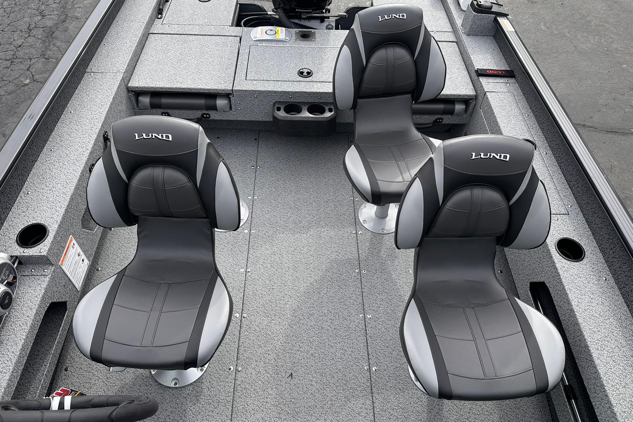 2026 Lund 1775 Adventure Sport boat interior with three cushioned seats.