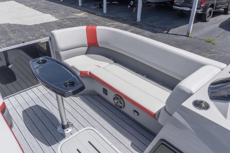 2026 SunCatcher Select 322SL boat interior with sleek seating and modern table design.