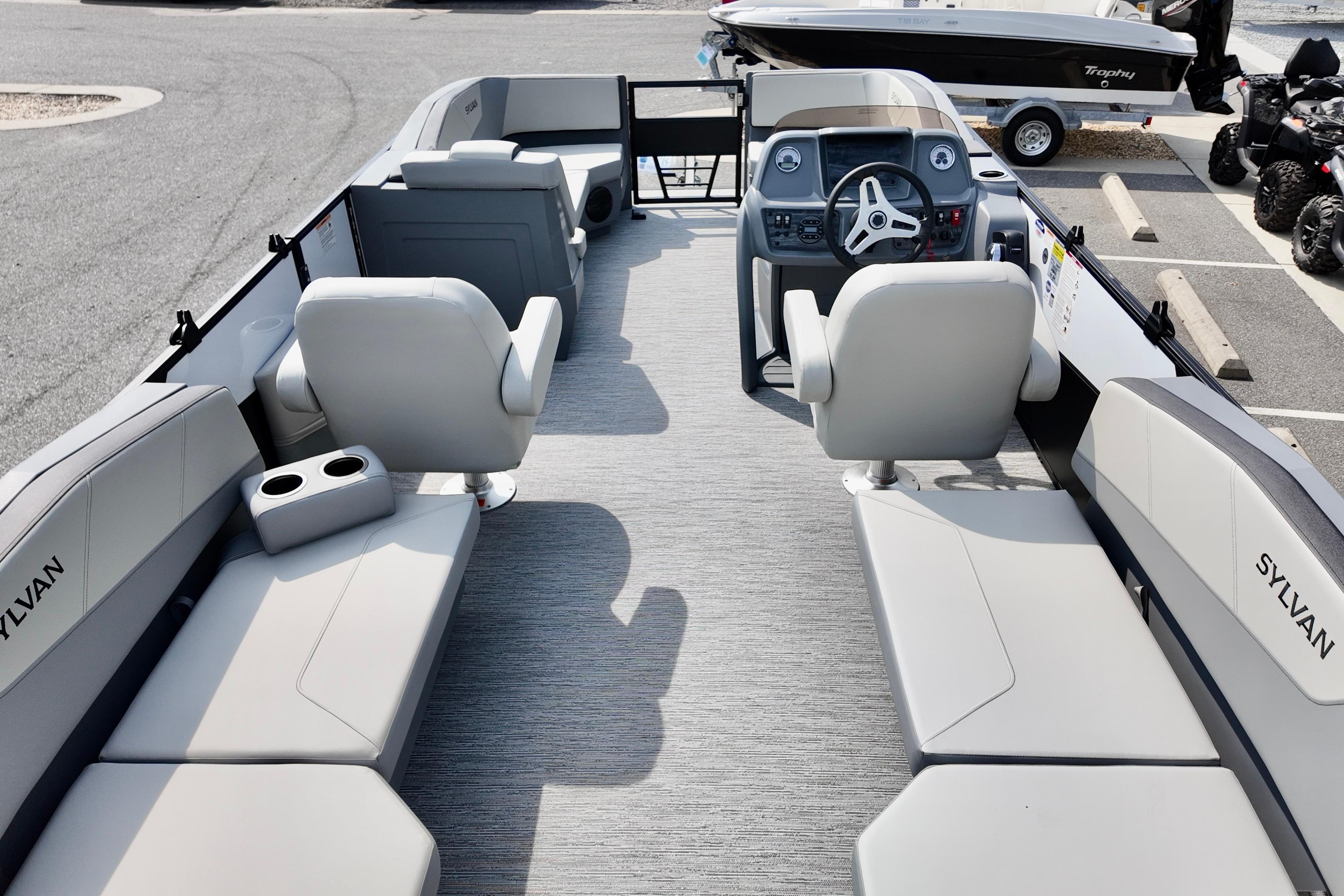 2026 Sylvan A-20 LZ DH pontoon boat interior with modern seating and steering console.