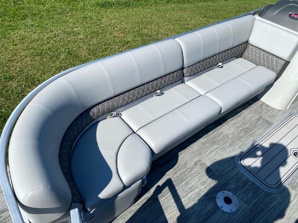2024 Ranger Reata 223C boat interior with plush seating and modern design.