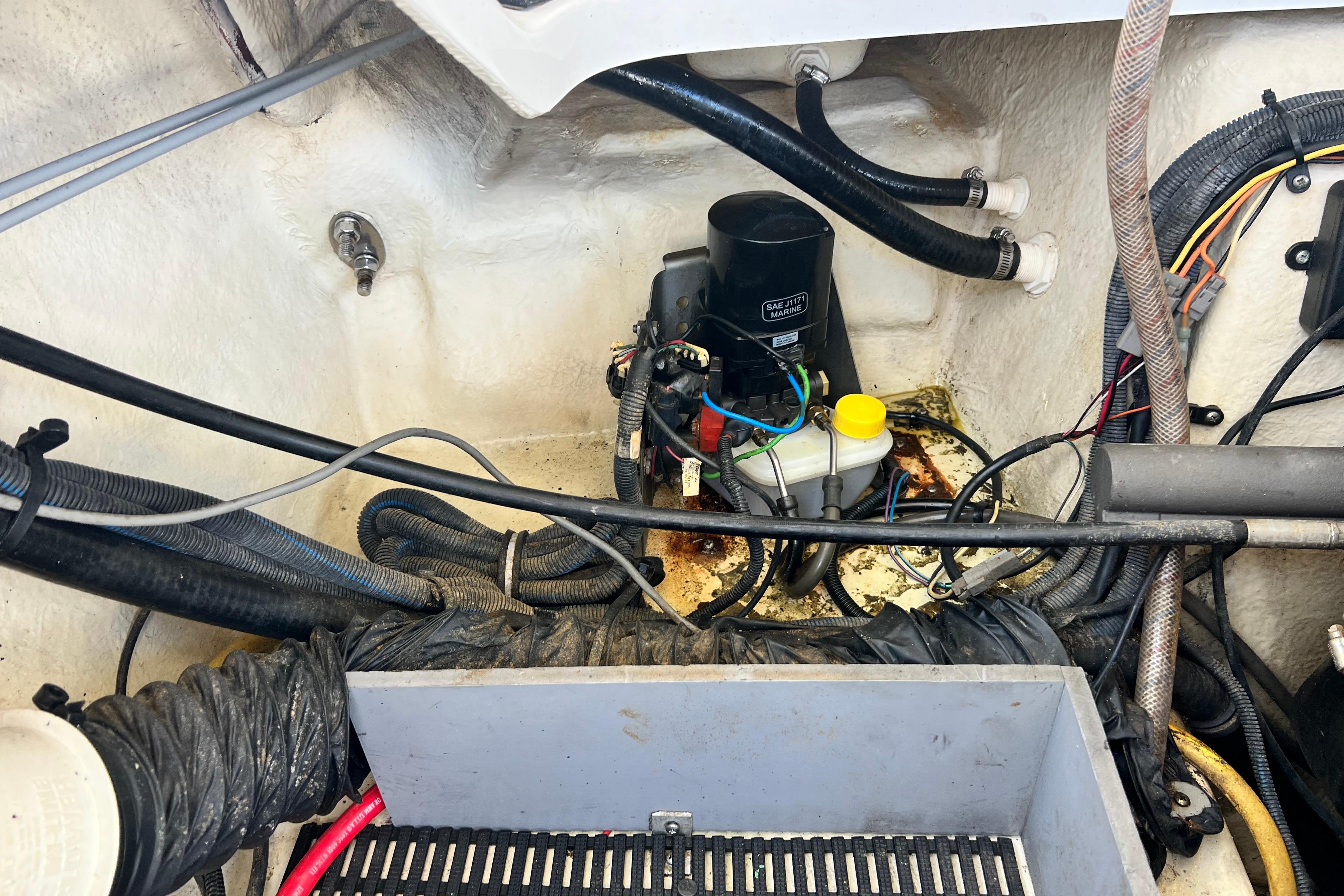 Engine compartment of a 2015 Monterey 268SS Super Sport boat, showing wiring and components.