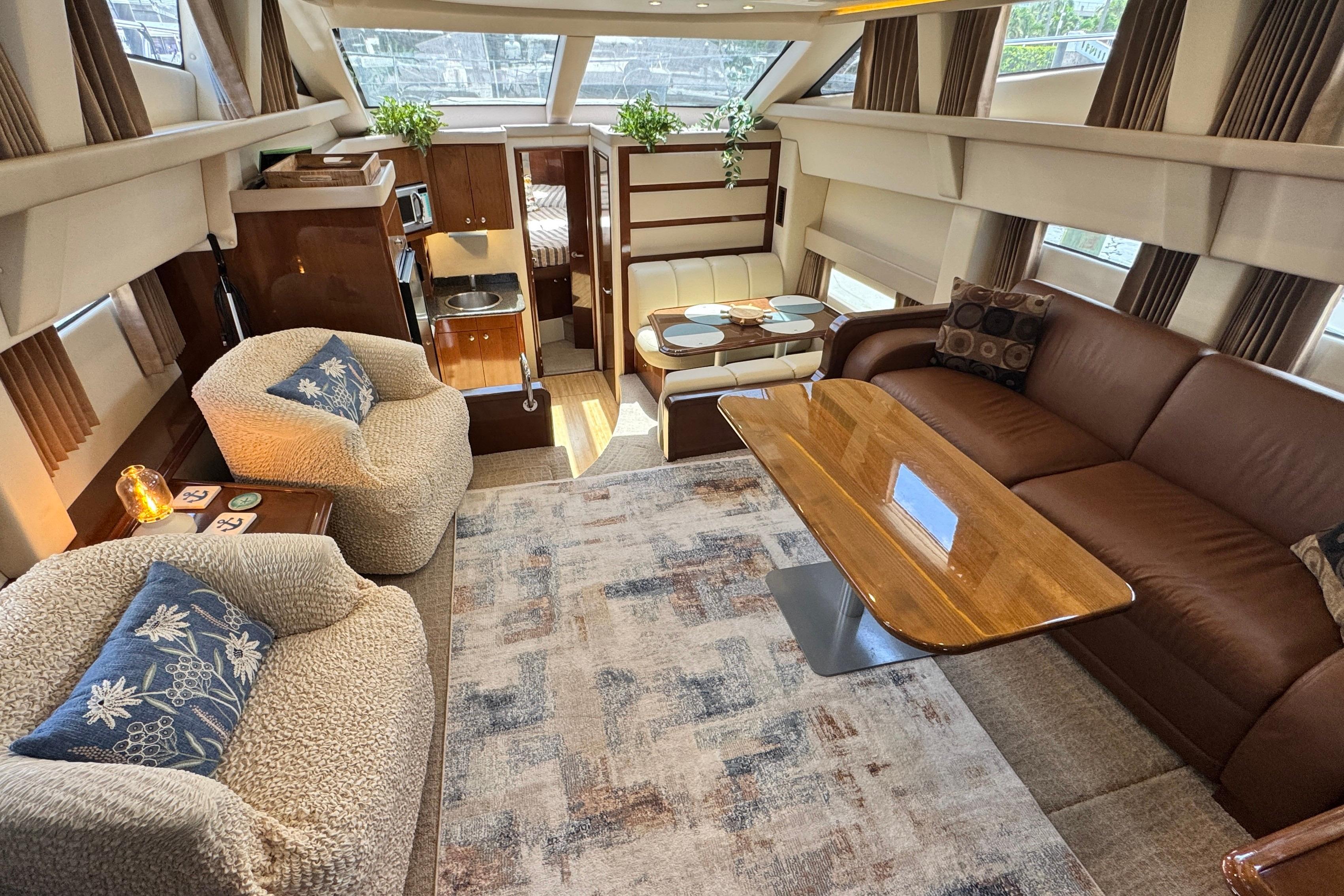 2007 Carver 47 Motor Yacht Salon with Plush Seating and Elegant Decor