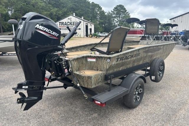 2026 Tracker Grizzly 1650 T Prairie Wings Edition boat with Mercury engine on trailer.