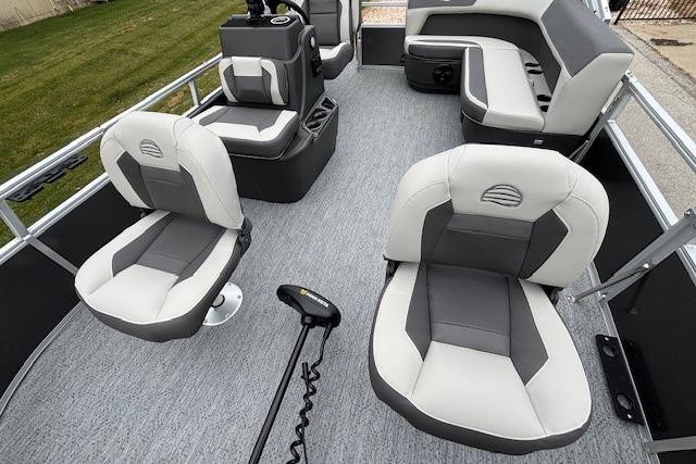 2026 Sun Tracker Bass Buggy 16 XL Select pontoon boat interior with plush seating and modern design.