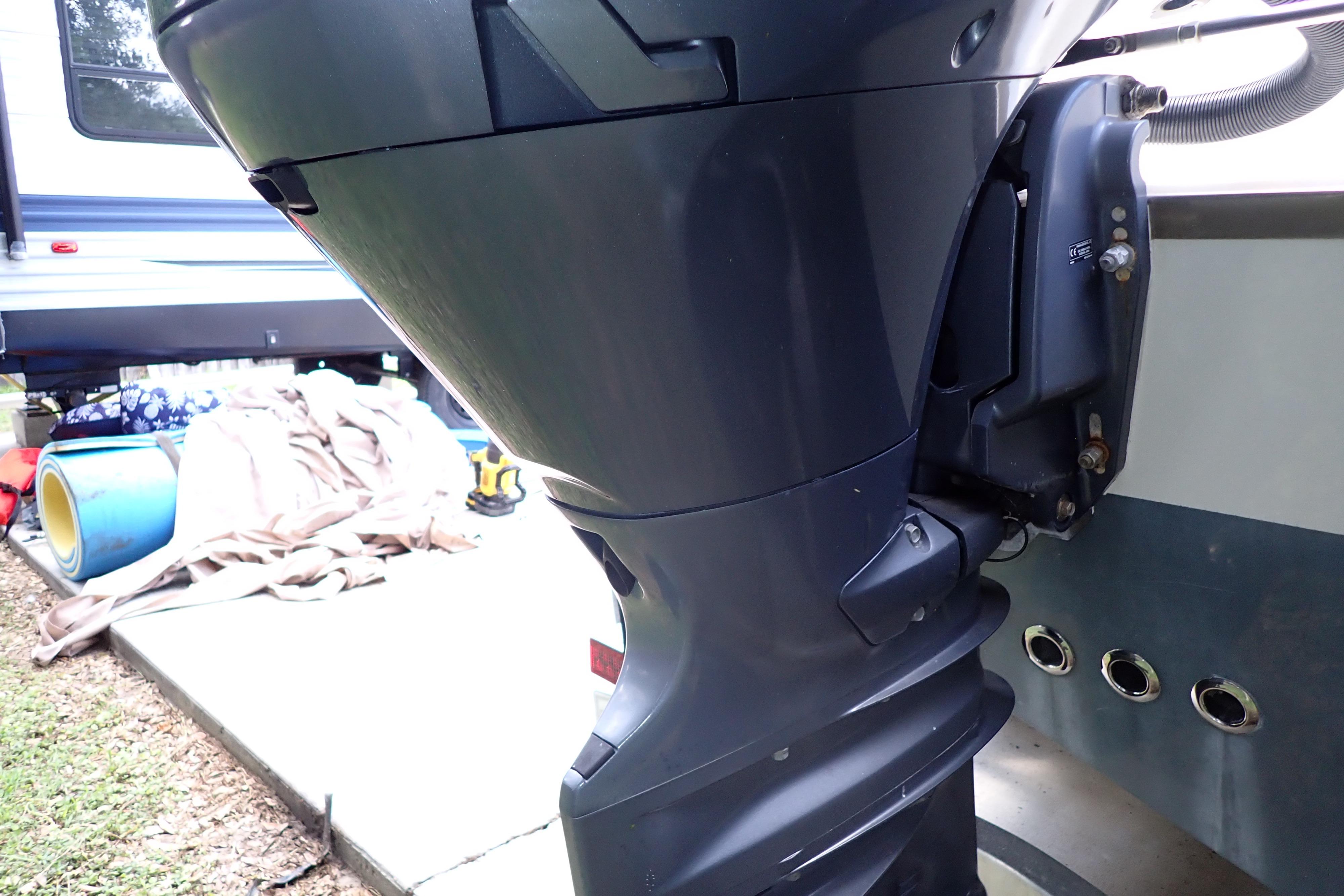2019 Key West 263 FS boat motor close-up with outdoor background.