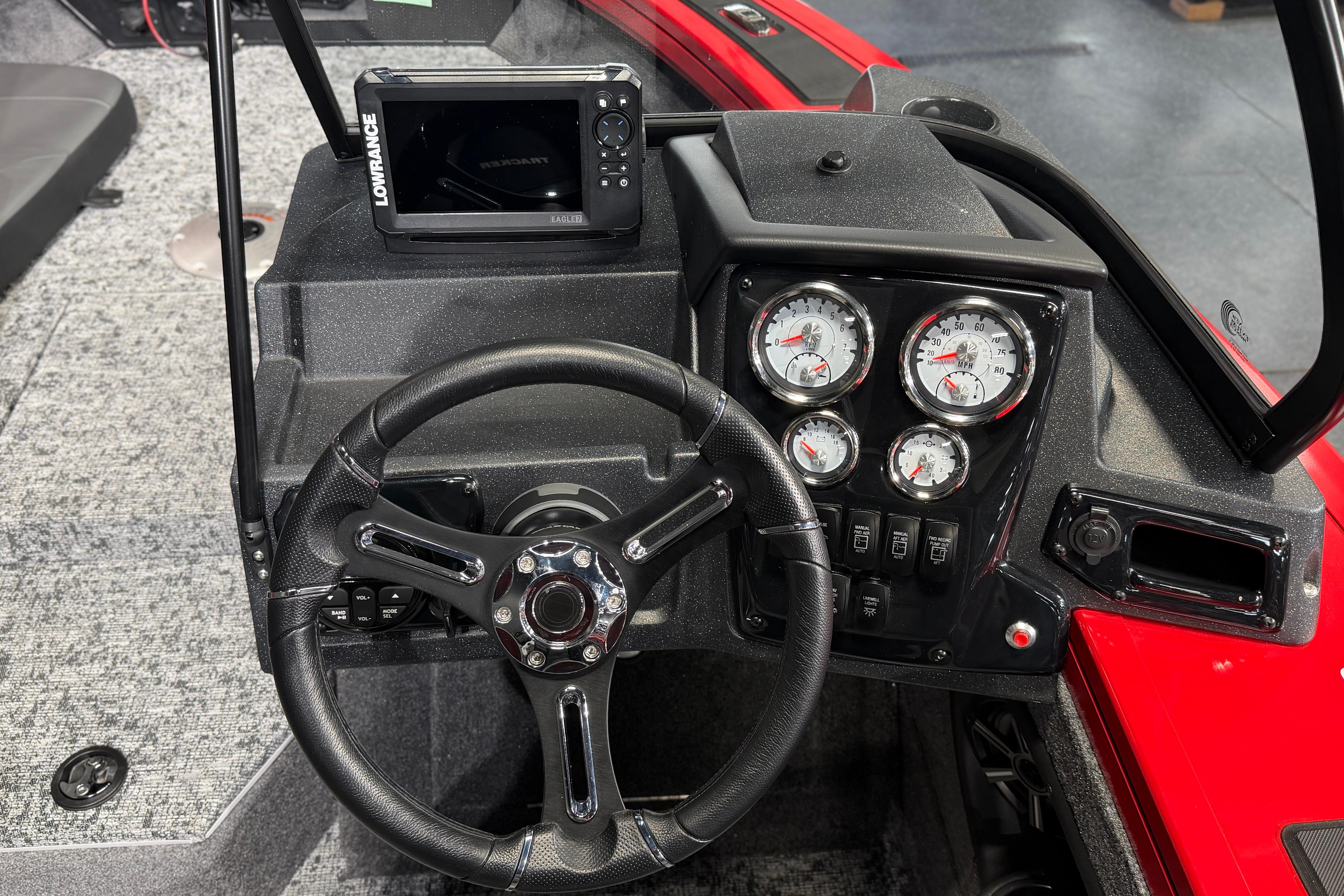 Steering console of 2026 Tracker Targa V-18 Combo with gauges and Lowrance display.