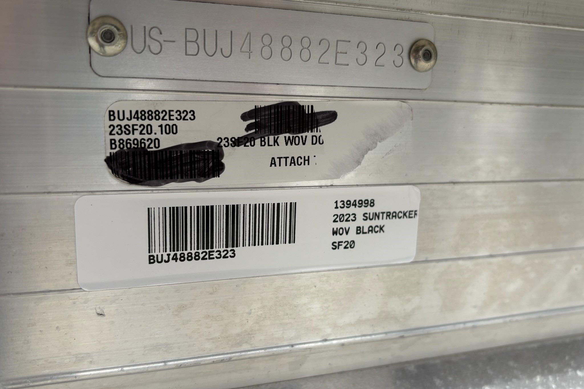 2023 Sun Tracker SportFish 20 DLX identification plate with serial and model details.