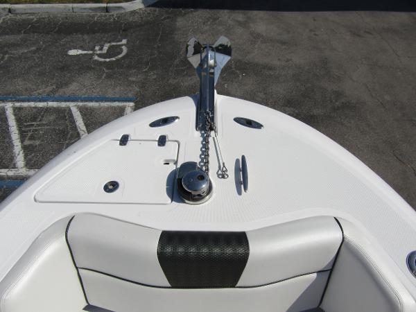 2024 Wellcraft 263 Fisherman boat bow with anchor and seating.