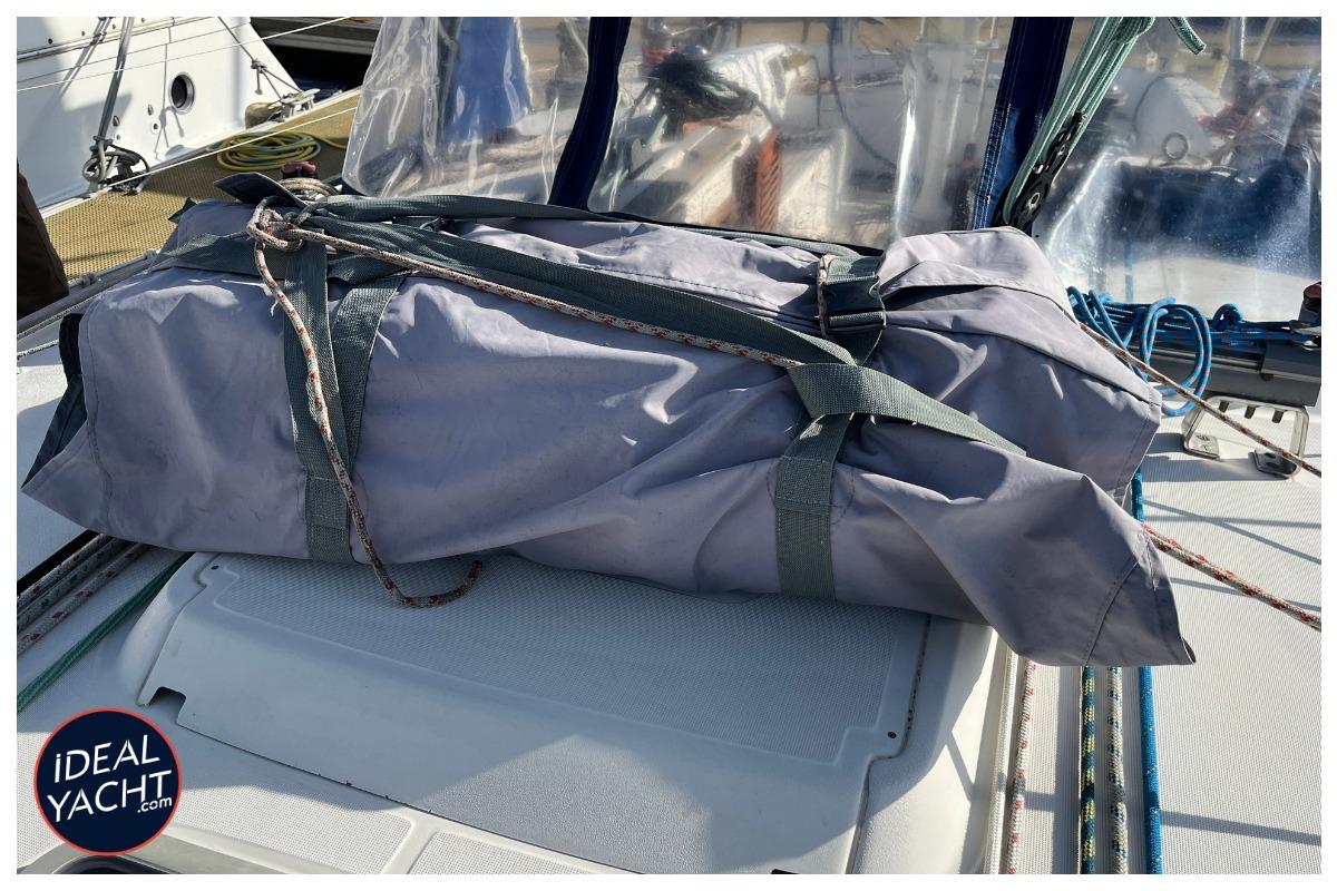 Bag on deck of 1998 Dufour 50 Classic yacht, secured with straps.